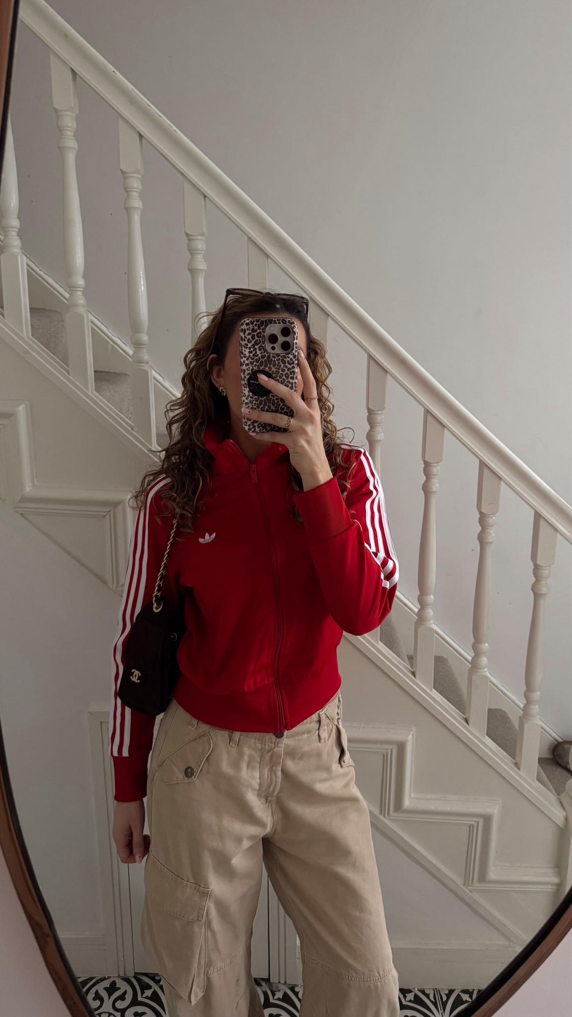 An everyday casual outfit idea I’m wearing on repeat. I love these adidas Firebird track tops. I am wearing a size large in this one. It runs small. These Zara cargo pants have a bit of a barrel leg and are so comfortable. They make such a nice change to jeans. 