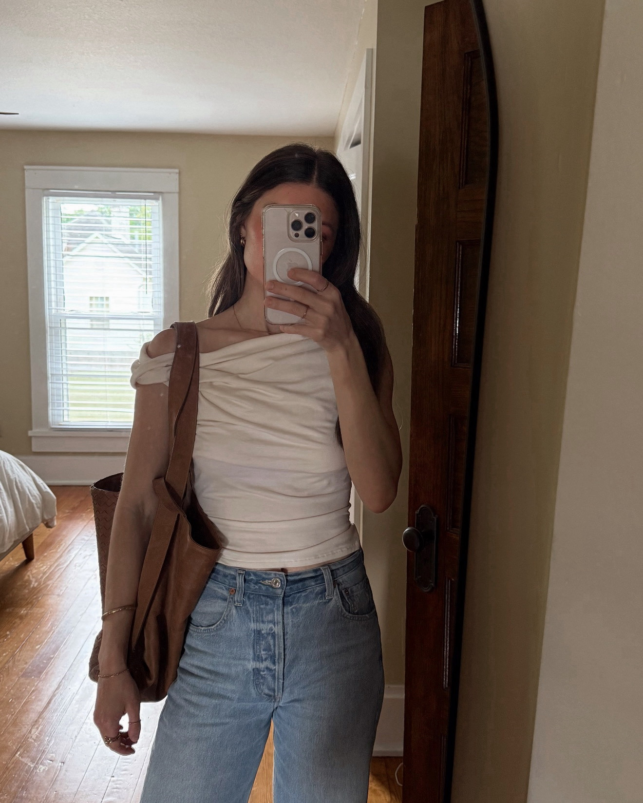 Size small in top and 24 jeans! Size down 1-2 they run pretty loose and will still give you a good oversized fit 