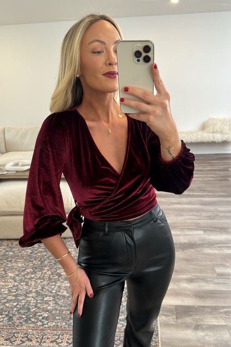 Favorite holiday top I think this top is so pretty with the velvet color and it’s on sale for Black Friday weekend. Perfect to wear it to your next holiday party. Leather pants are also on sale for Black Friday.

#LTKCyberSaleNL #LTKCyberSaleUK #LTKCyberWeek