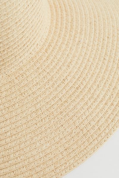 Hat in braided paper straw with a wide, sloped brim and grosgrain band inside.CompositionPaper 10... | H&M (US + CA)