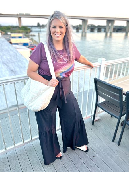 ✨SIZING•PRODUCT INFO✨
⏺ Black Wide Leg Lightweight Quickdry Ruffled Boho Athletic Pants with Waist Tie •• XL •• TTS •• Halara  
⏺ Sherpa Sandals •• TTS •• Steve Madden 
⏺ Ivory Quilted Nylon Slouchy Bag •• Temu 
⏺ Purple Graphic Tee •• L •• TTS •• Target

👋🏼 Thanks for stopping by!

📍Find me on Instagram••YouTube••TikTok ••Pinterest ||Jen the Realfluencer|| for style, fashion, beauty and…confidence!

🛍 🛒 HAPPY SHOPPING! 🤩

#target #targetfinds #founditattarget #targetstyle #targetfashion #targetoutfit #targetlook #graphic #tee #graphictee #graphicteeoutfit #tshirt #graphictshirt #t-shirt #band #bandtee #graphicteelook #graphicteestyle #graphicteefashion #graphicteeoutfitinspo #graphicteeoutfitinspiration #sandals #springsandals #summersandals #springshoes #summershoes #flipflops #slides #summerslides #springslides #slidesandals Boho, boho outfit, boho look, boho fashion, boho style, boho outfit inspo, boho inspo, boho inspiration, boho outfit inspiration, boho chic, boho style look, boho style outfit, bohemian, whimsical outfit, whimsical look, boho fashion ideas, boho dress, boho clothing, boho clothing ideas, boho fashion and style, hippie style, hippie fashion, hippie look, fringe, pom pom, pom poms, tassels, california, california style,  #boho #bohemian #bohostyle #bohochic #bohooutfit #style #fashion #athletic #althleticwear #athleticoutfit #athleticstyle #athleticlook #athleticfashion #athleisure #athleisurewear #athleisureoutfit #athleisurelook #athleisurestyle #athleisurefashion #sport #sportyoutfit #sportoutfit #sportylook #sportlook #sportstyle #sportystyle #sportyfashion  
#under10 #under20 #under30 #under40 #under50 #under60 #under75 #under100
#affordable #budget #inexpensive #size14 #size16 #size12 #medium #large #extralarge #xl #curvy #midsize #blogger #vlogger
budget fashion, affordable fashion, budget style, affordable style, curvy style, curvy fashion, midsize style, midsize fashion



#LTKSeasonal #LTKunder50 #LTKcurves
