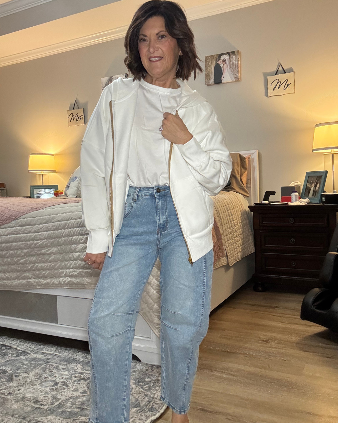 This white hoodie with the gold zipper detail is such a chic upgrade to a classic staple. I love how it instantly makes a casual outfit feel more polished without losing that comfy vibe. Styled here with an oversized tee and relaxed barrel jeans for an effortlessly cool, everyday look. Perfect for layering year-round, this hoodie is one of those pieces you’ll keep reaching for whether you’re running errands, traveling, or just lounging in style. 

 