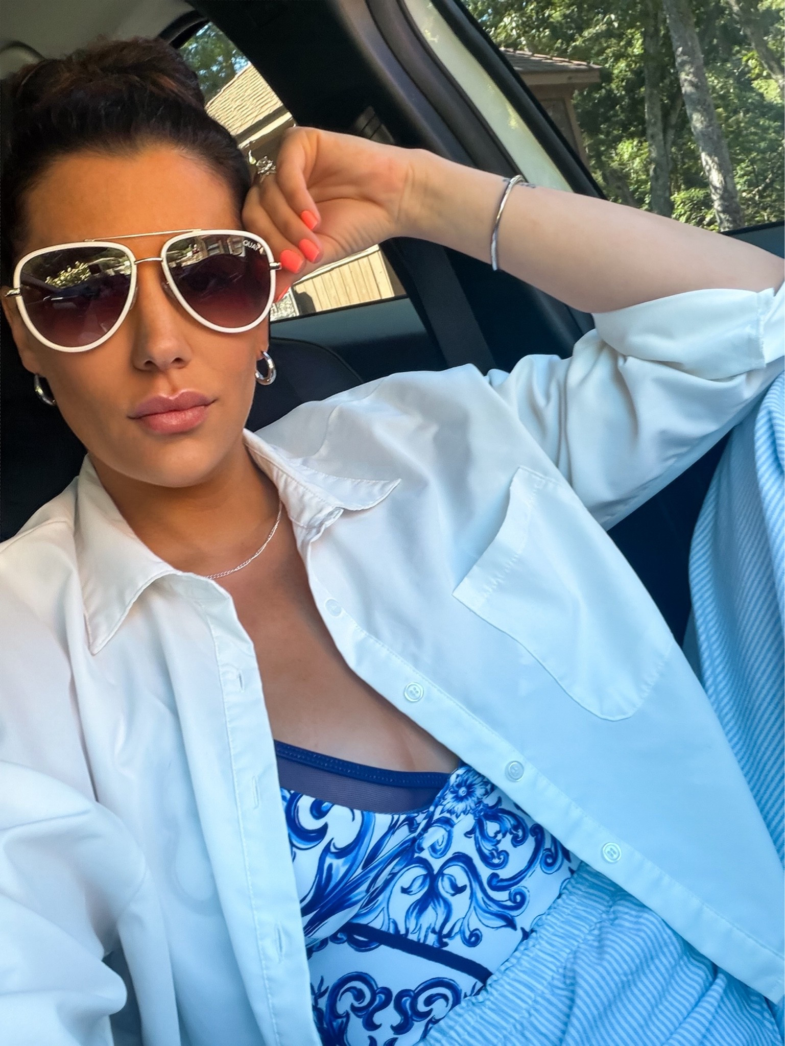 Endless summer aesthetic 🌊 

White oversized button-down cover-up, white aviators, and coastal blue prints.
