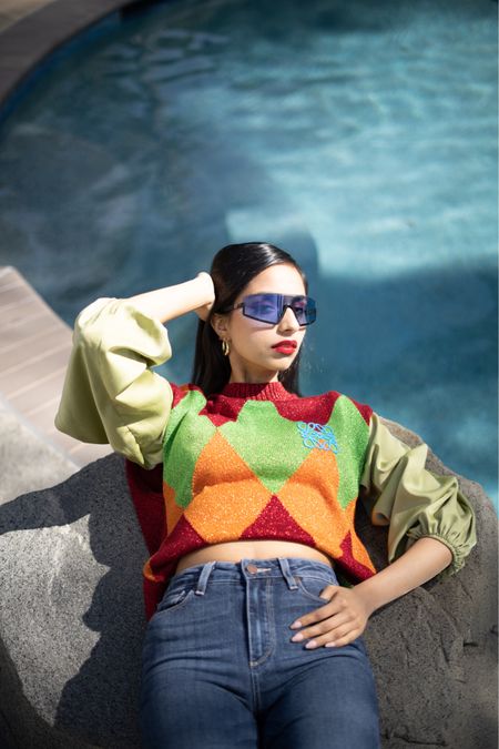 Spring Outfit Ideas - Vacation Outfit, Loewe Sweater, Colorful Sweater, Sweater Vest, Blue Sunglasses, Sporty Sunglasses 

#LTKSeasonal #LTKtravel #LTKunder100