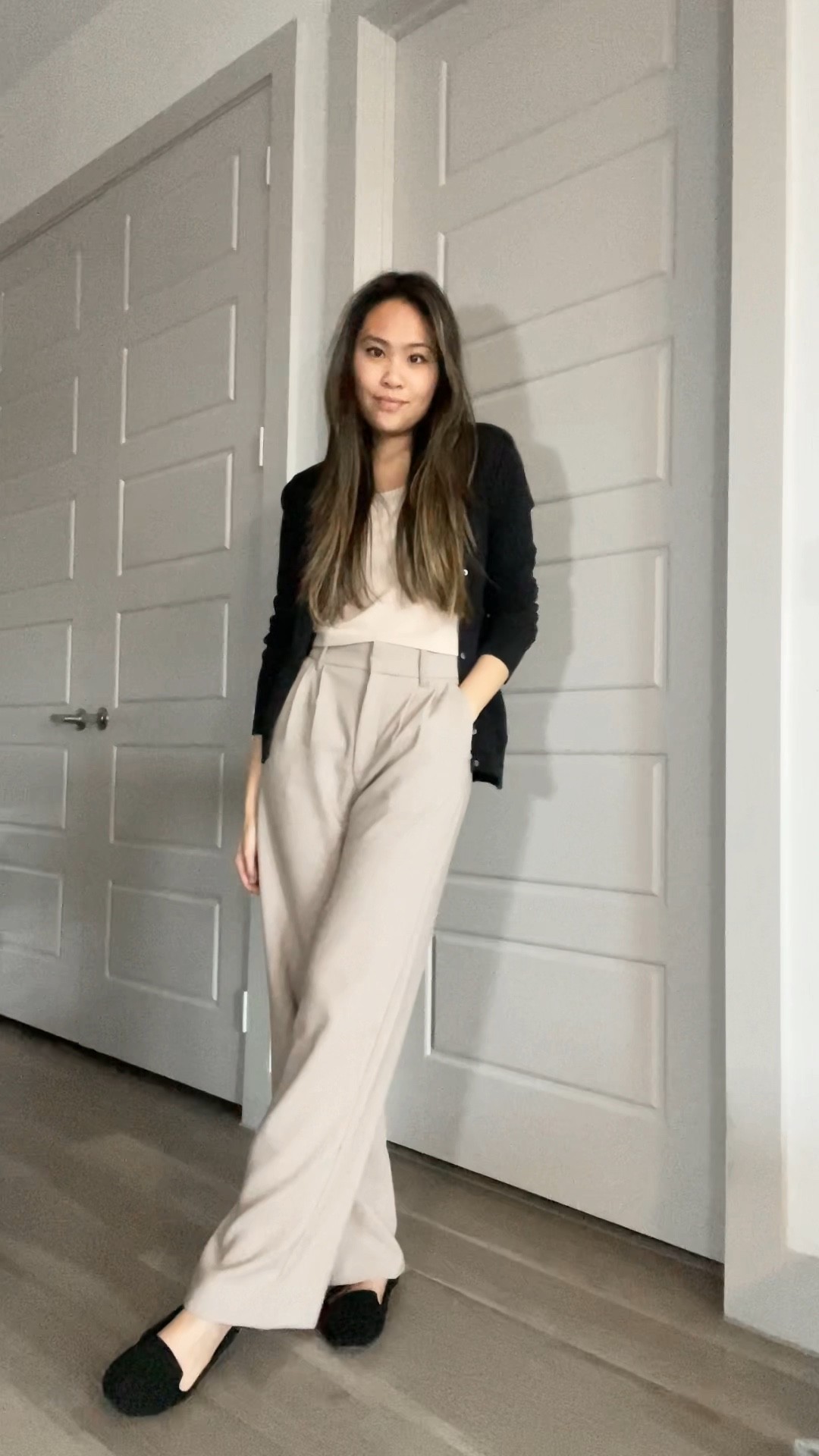 Minimal and neutral work office outfit. Aerie blush pink cami top, taupe wide leg pants, black flats, black cardigan. Abercrombie style

#LTKstyletip #LTKworkwear #LTKSeasonal