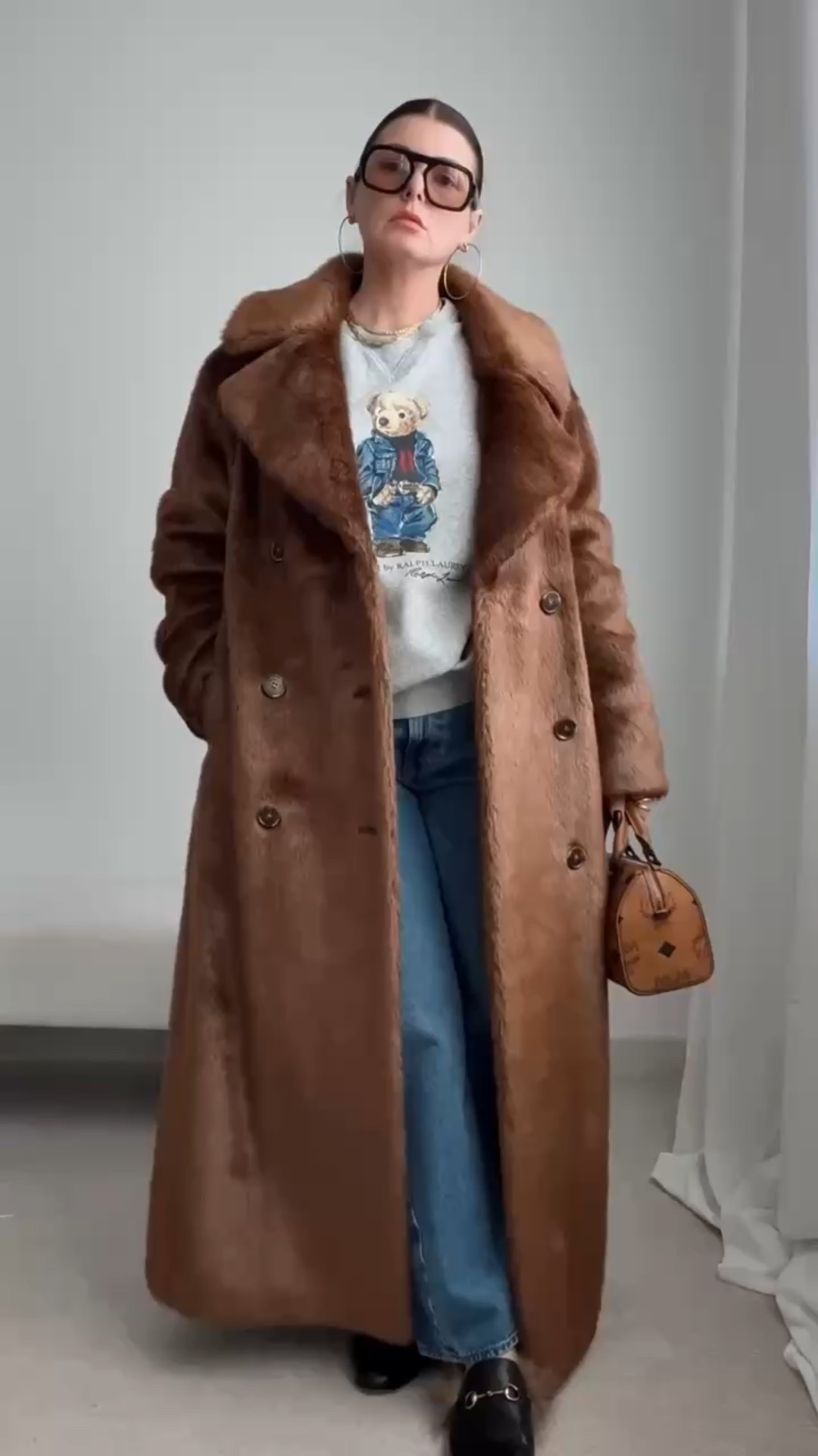 Winter outfit 
Faux fur coat
Sweatshirt 
Polo bear

#LTKSeasonal