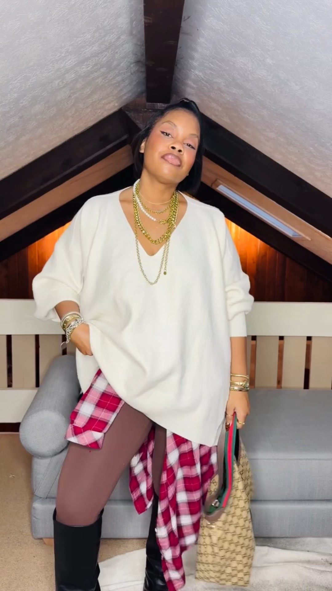 Hey boo! Here I go layering my plaid pajamas shirt again! Y’all know it’s a fav of mine to layer! The fabric, print and color always pops! Paired with this oversized sweaters, leggings and boots! Easy and chic and balanced! ✨

What y’all think?

Can’t forget you gotta have the jewelry too! Wearing a couple @rachelnathandesign necklaces! You can use my discount code on their website for 15% off - MSV15
•
•
Style over 40, workwear style, effortless style, jewelry style