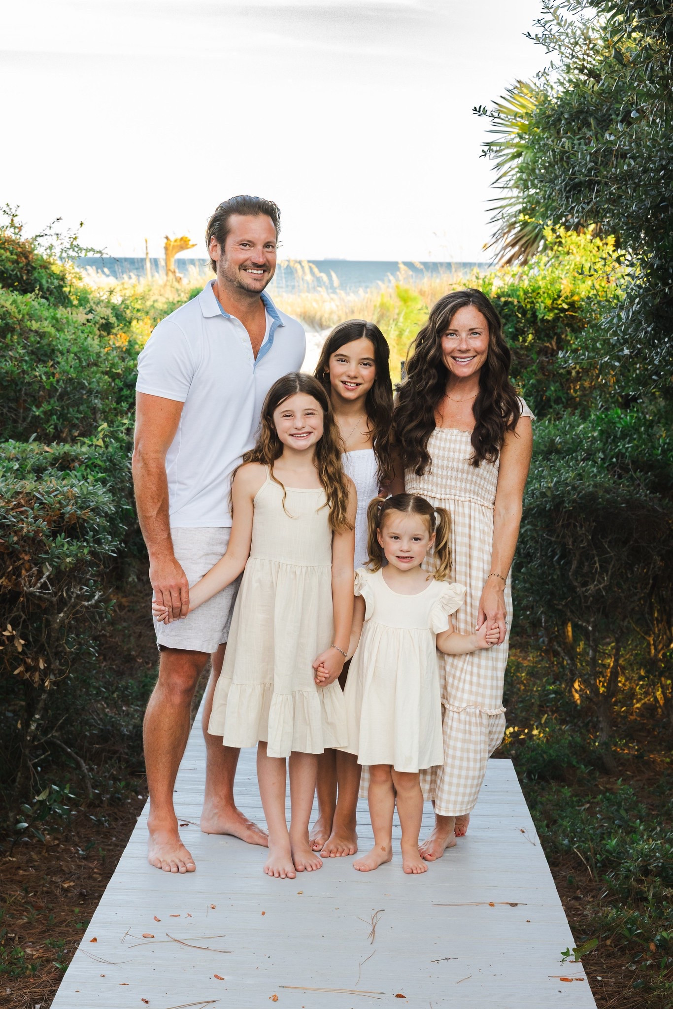 Family Photo Outfits - What my family of 5, 3 girls and 2 parents, wore for beach family photos in Hilton Head. Tan and White theme outfits. 

#LTKKids #LTKFamily #LTKFindsUnder100