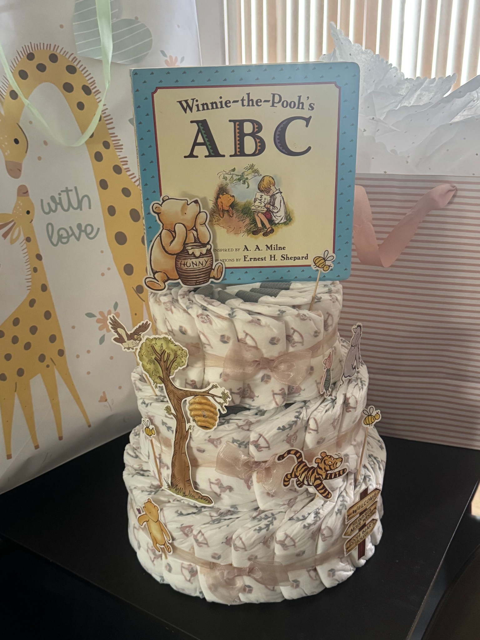 Made a Winnie the Pooh Diaper Cake for my best friend’s baby shower 💕 I used the new Millie Moon Diaper Cake box so I just had to add decorations! 

#LTKBaby #LTKBump