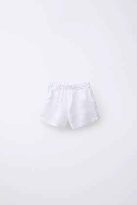 Bermuda shorts with an elasticated waistband, front pockets and rear patch pockets. Made from 100... | Zara UK