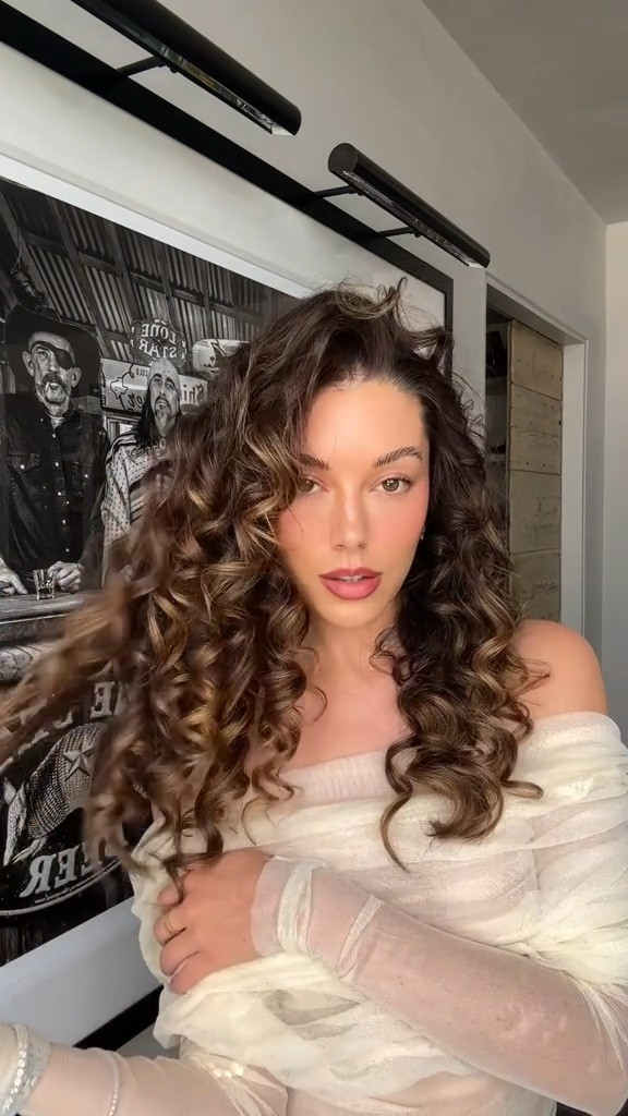 Attempting to curl my hair with a TINY curling iron. What do we think?