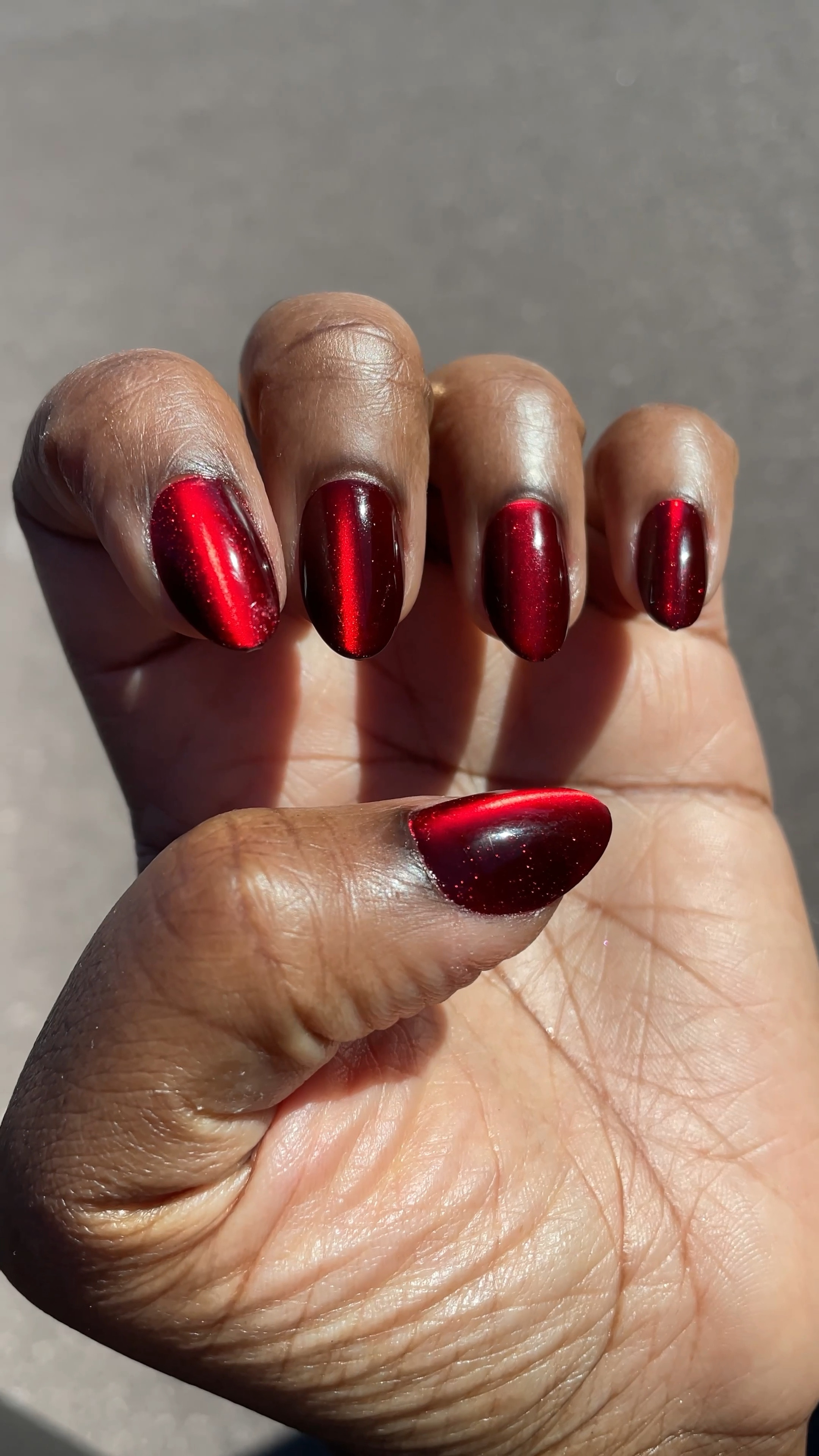 Red Cat Eye Velvet Presson nails from Olive & June perfect for fall or Halloween!

#LTKStyleTip #LTKHalloween #LTKBeauty