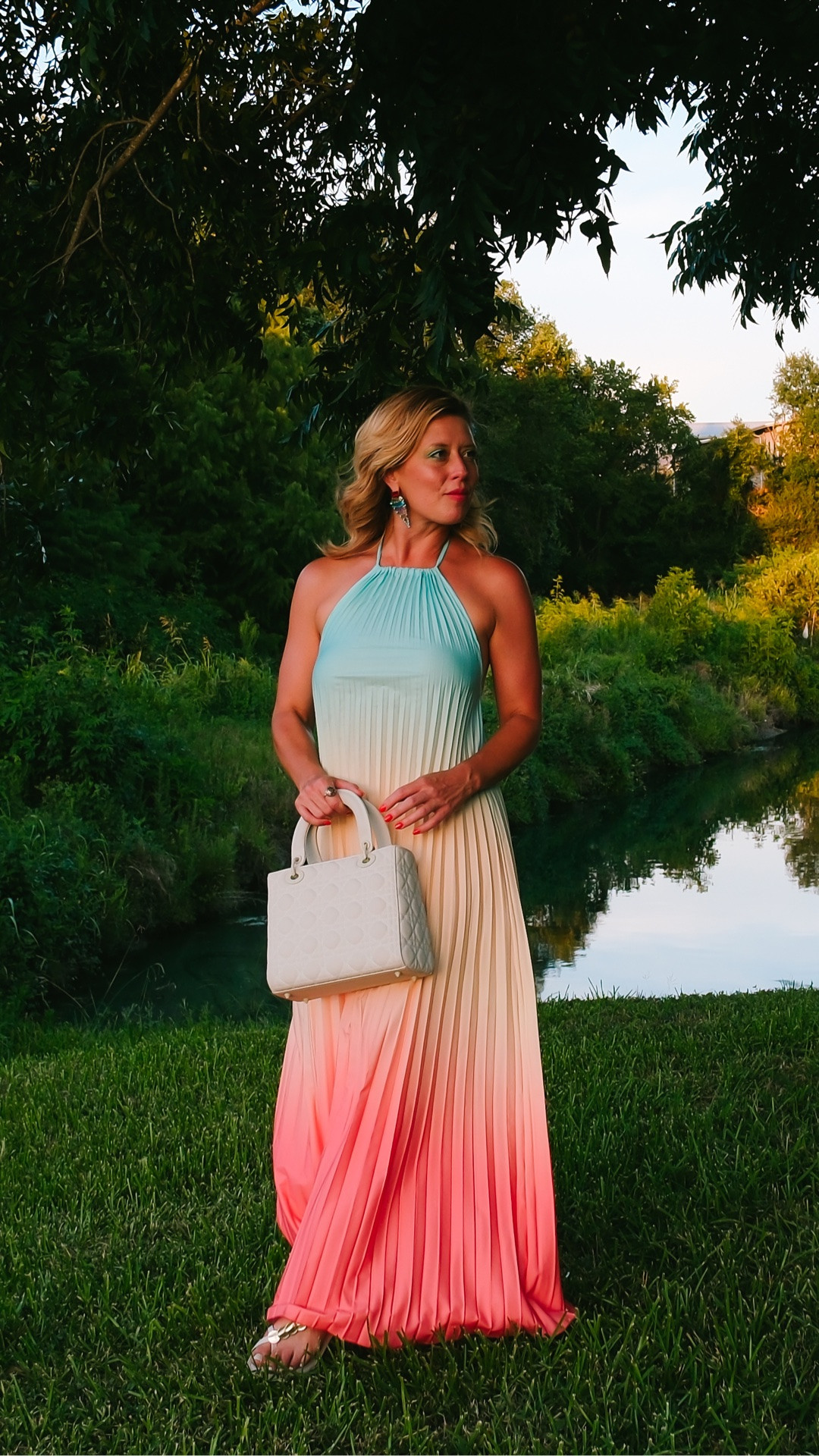 Sherbet ombré pleated dress paired with a pretty Dior lady bag and lace up sandals.
Colorful Linny Co earrings for the finishing touch! 

Shop tops of Sorbet inspired dresses below!

#LTKTravel #LTKOver40 #LTKootd