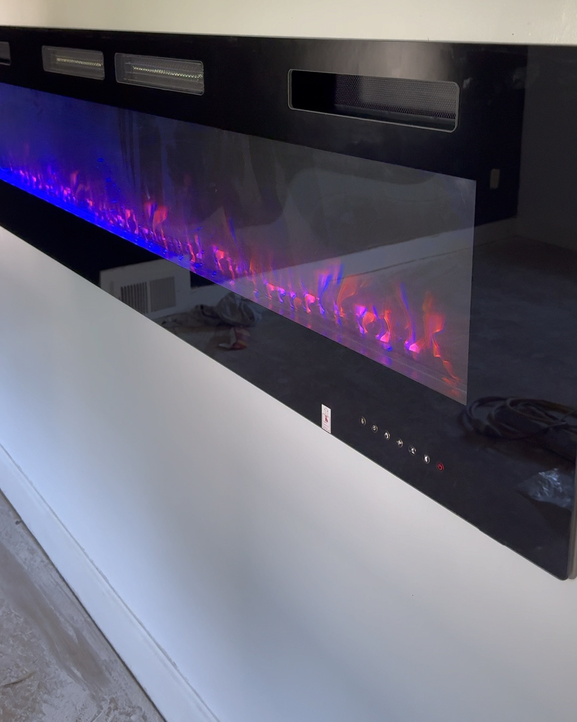 Electric wall fire place 

#LTKHome #LTKVideo #LTKStyleTip