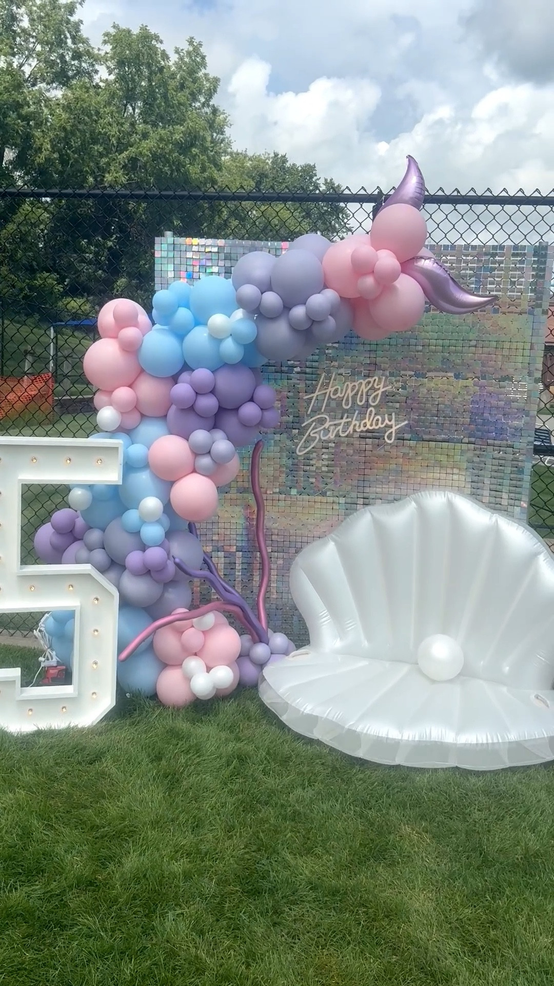 This pastel balloon arch + shimmer wall + seashell chair combo makes the ultimate mermaid birthday backdrop! Perfect for a birthday party, under the sea theme, or any mermaid party idea. With custom balloons, a shell throne, and sparkle shimmer wall, this kids party decoration is designed to wow your guests and create the perfect photo spot.

#LTKParties #LTKKids #LTKFamily