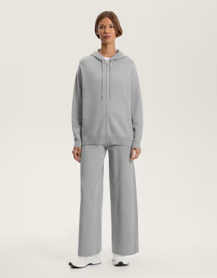 OYSHO Long knit jacket with hood in black | ASOS (Global)