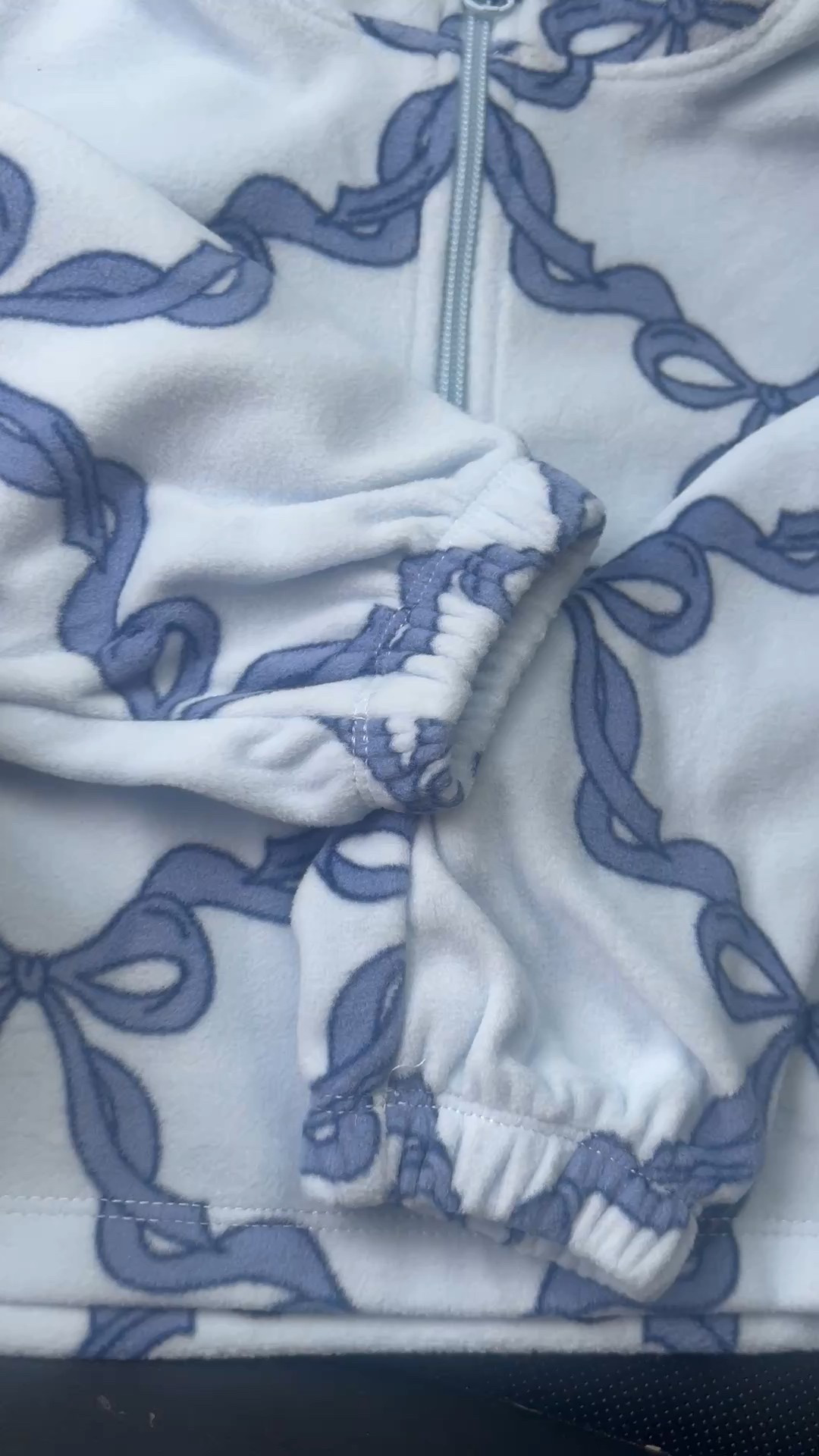 the cutest softest little zip up - loving the blue bows 🦋 so cozy and detailed and all for under $10 right now. 

#LTKSaleAlert #LTKKids