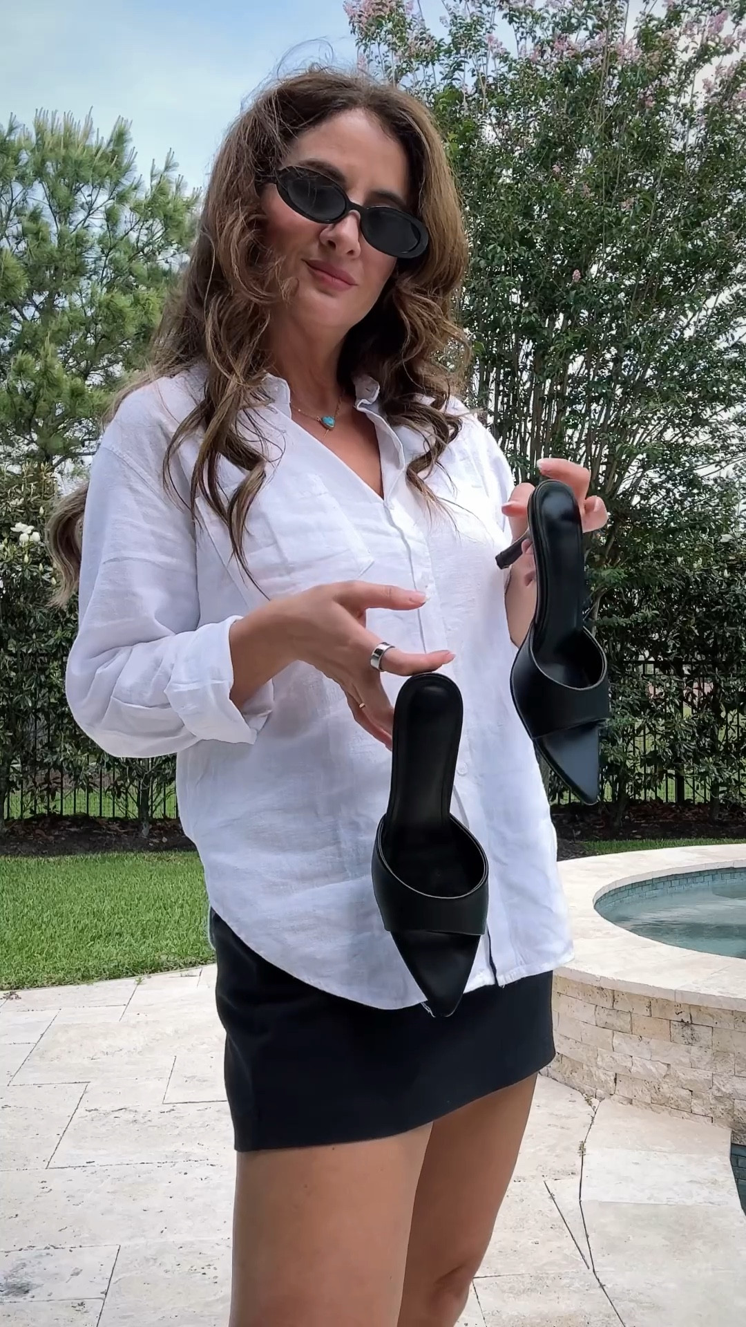 Linen button down shirt with black skort and black  heel

#LTKU #LTKOver40 #LTKootd