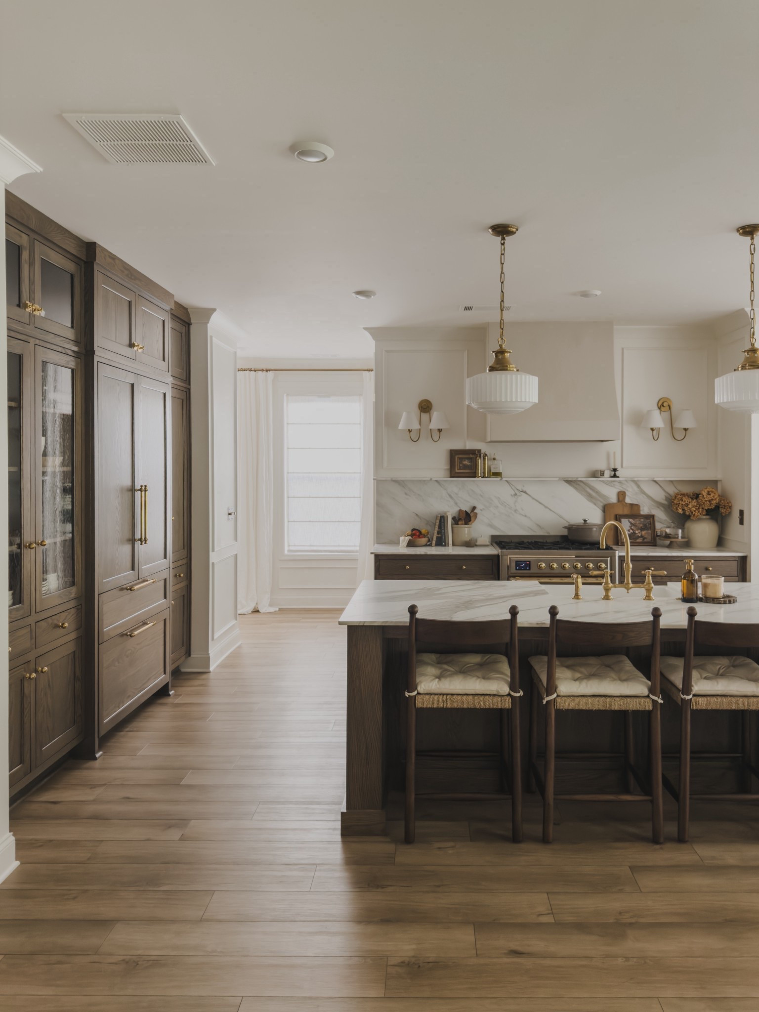 Simple seasonal swaps in my kitchen for fall including faux stems and a collected style. Staying with a minimal look but creating a statement with rich wood tones and timeless furniture pieces.

Home inspo, neutral wood tones, furniture favorites, collected style, fall refresh, timeless kitchen inspo, linen detail, neutral kitchen, counter stool, brass detail, unlacquered brass, wall sconce, kitchen pendant, faux stems, Wayfair, Rejuvenation, Home and Kids Co, McGee and Co, Visual Comfort, found it on Amazon, shop the look!#LTKStyleTip 

#LTKHome #LTKSeasonal