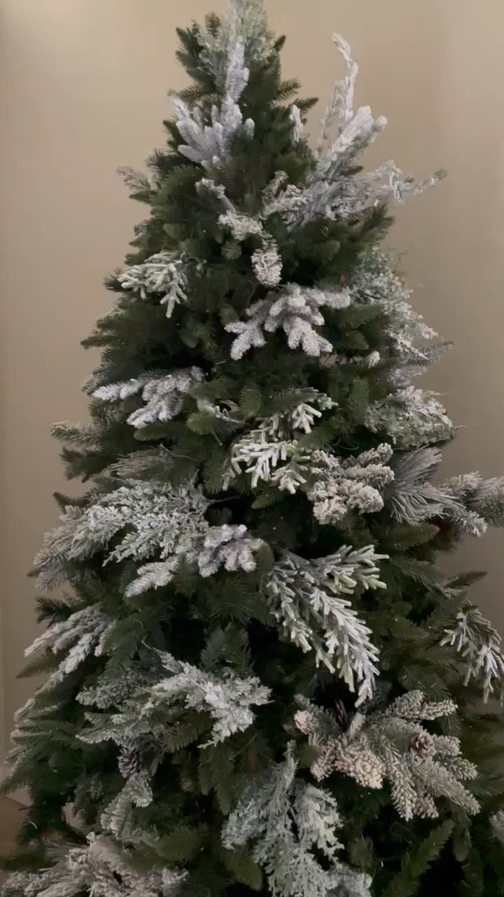 Give your green Christmas tree a snowy flocked look by adding flocked picks and stems 

#LTKhome #LTKSeasonal #LTKHoliday