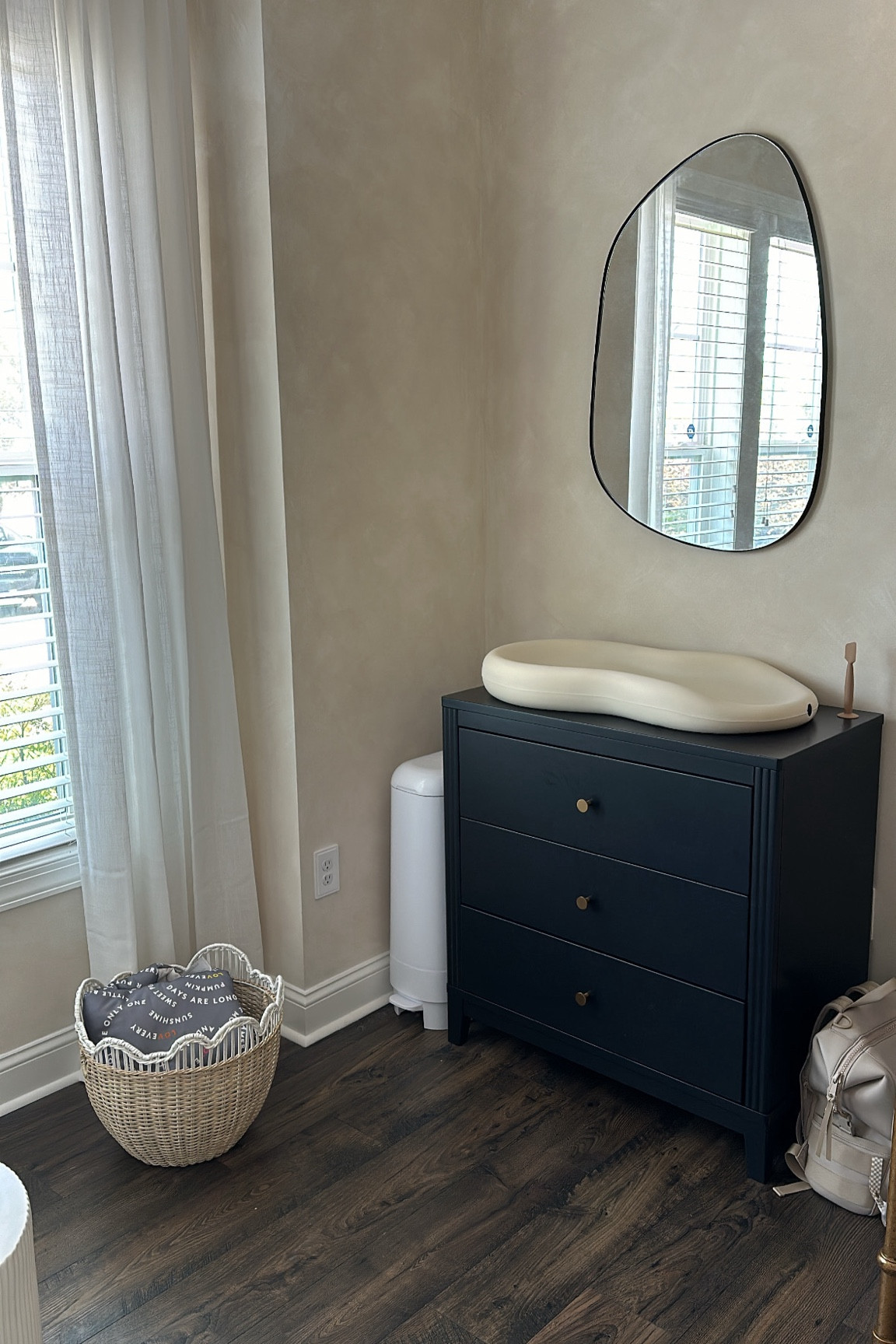 I am loving our nursery details!

Nursery decor, modern nursery, neutral nursery, girls nursery, diaper changing station, nursery mirror, curtains, nursery basket, neutral basket, black dresser, mirror, limewash paint 

#LTKHome #LTKBaby #LTKStyleTip