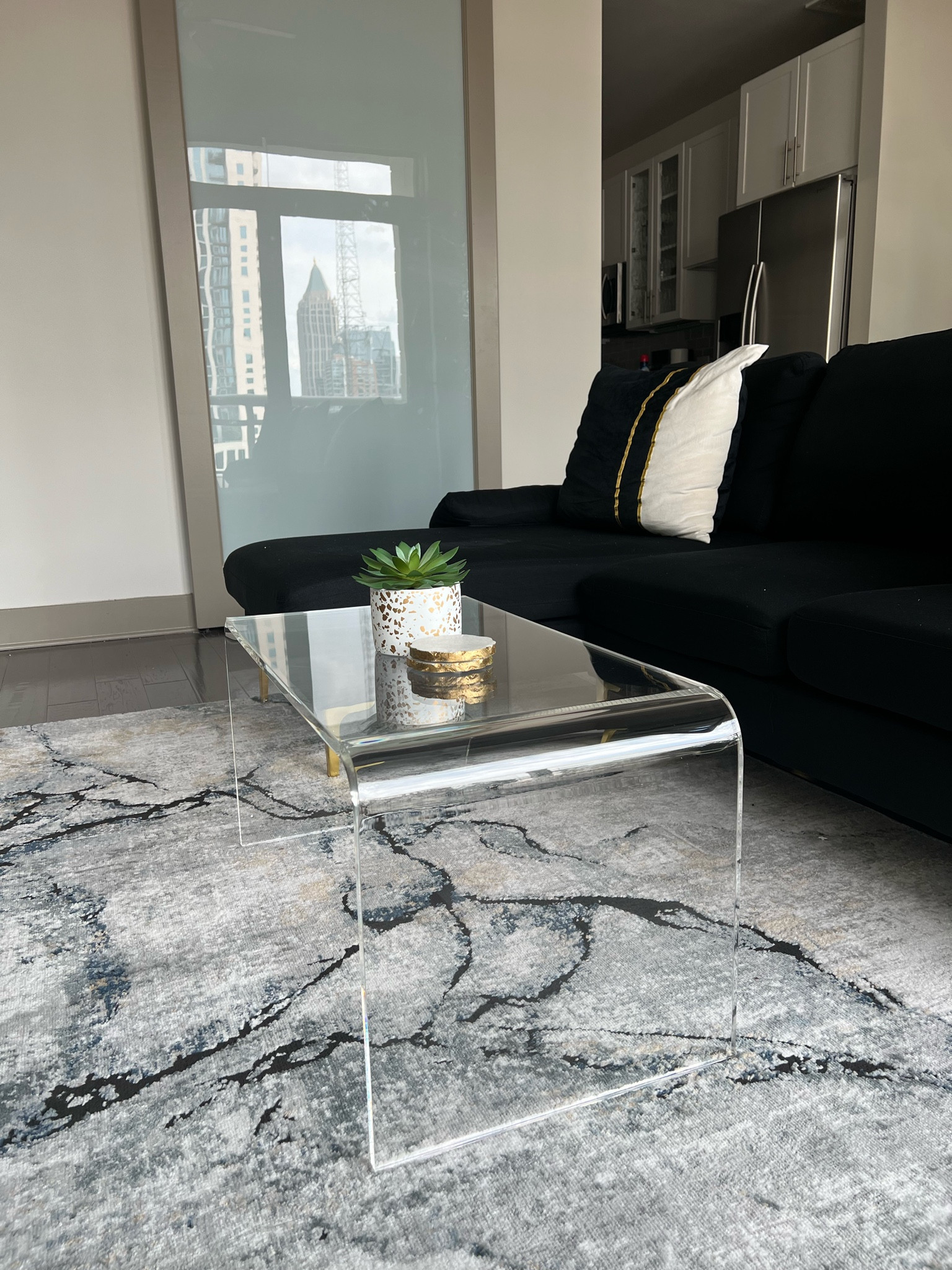 Small Space Acrylic Coffee Table and Black Couch with Sectional 



#LTKHome #LTKSaleAlert