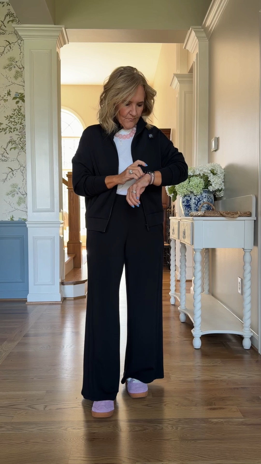 Spanks end of season sale includes this track jacket and track pants in black. I am wearing a medium in a jacket and a medium petite in the pants.

#LTKSaleAlert #LTKOver40 #LTKTravel