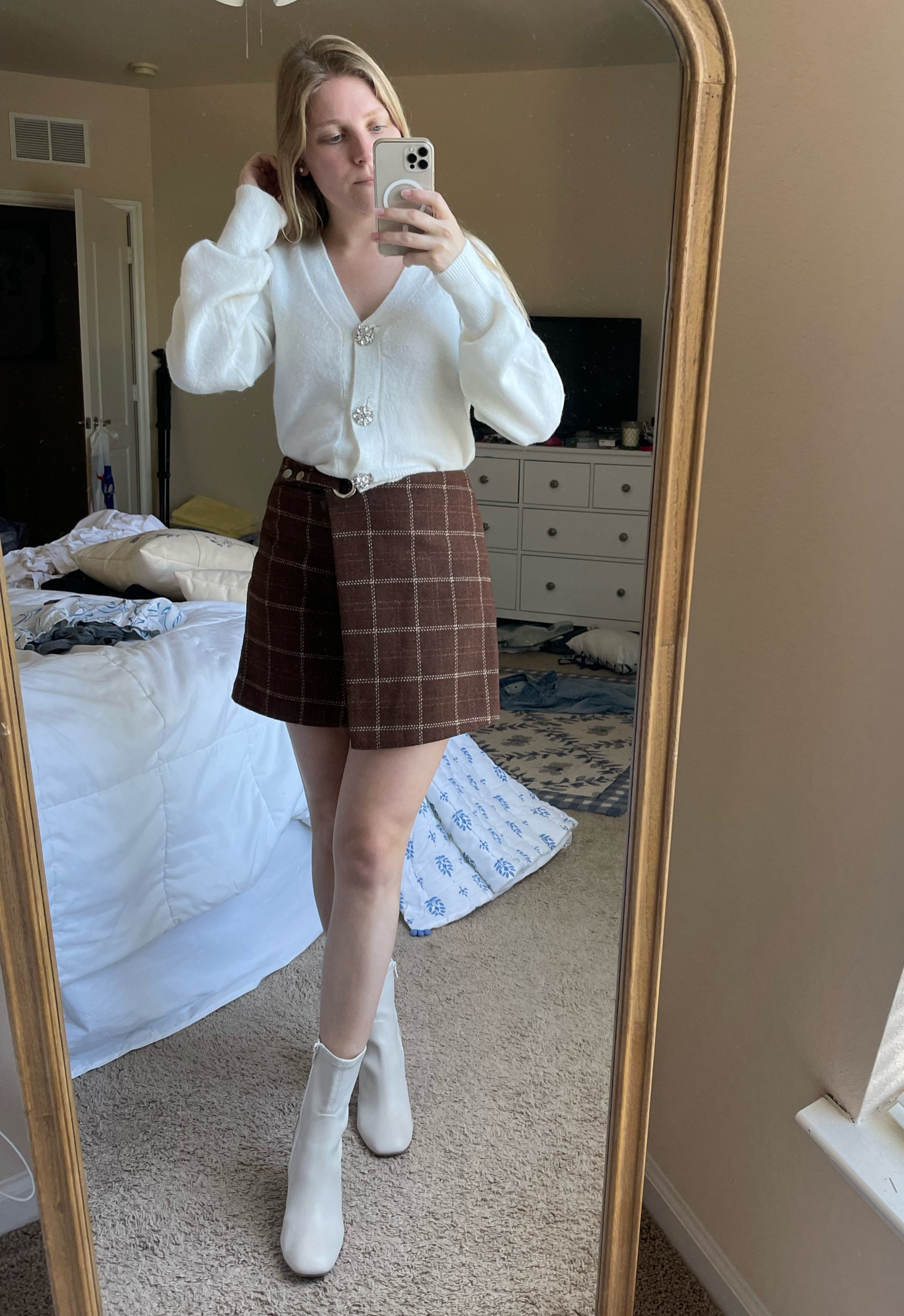 Summer to fall casual look. White cardigan with plaid mini skirt and white booties under $50  

#LTKSeasonal #LTKunder50