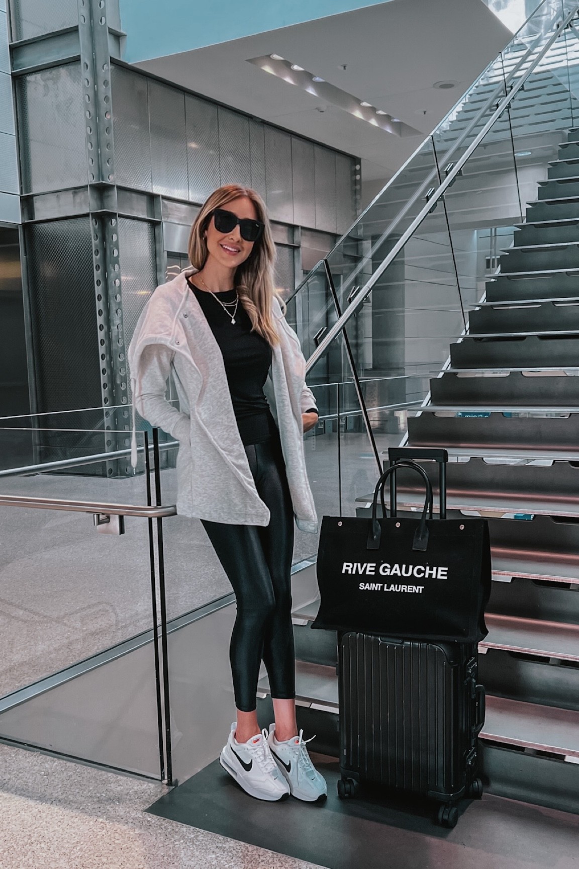 Airport outfit idea. Ultra comfortable and flattering black liquid leggings. Fits true to size size. I am wearing a size small. 
My favorite sneakers lately. Fits true to size size 

#LTKshoecrush #LTKunder100 #LTKtravel
