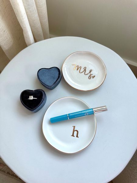 Engagement ring essentials 💎✨💍

I keep trinket dishes all over the house, one by the sink, one on my desk. The dazzle stick keeps my ring sparkling, and my favorite little heart velvet ring box keeps my ring safe 🥰 

#LTKfindsunder50 #LTKGiftGuide #LTKwedding
