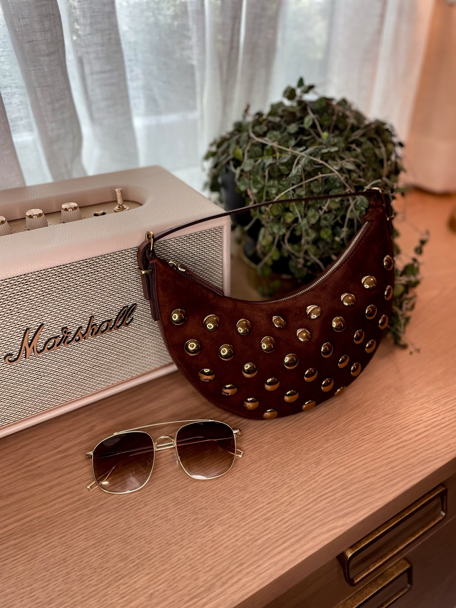 The chokehold this bag has one me. 🤤Fall style - studded bag- Bluetooth speaker- Sunnies 

#LTKItBag #LTKSeasonal #LTKStyleTip