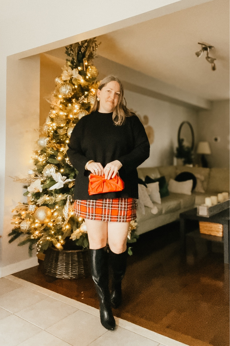 Christmas outfit
Plaid mini skirt, black sweater, black boots, gold jewelry, red purse

#LTKHoliday #LTKOver40 #LTKSeasonal