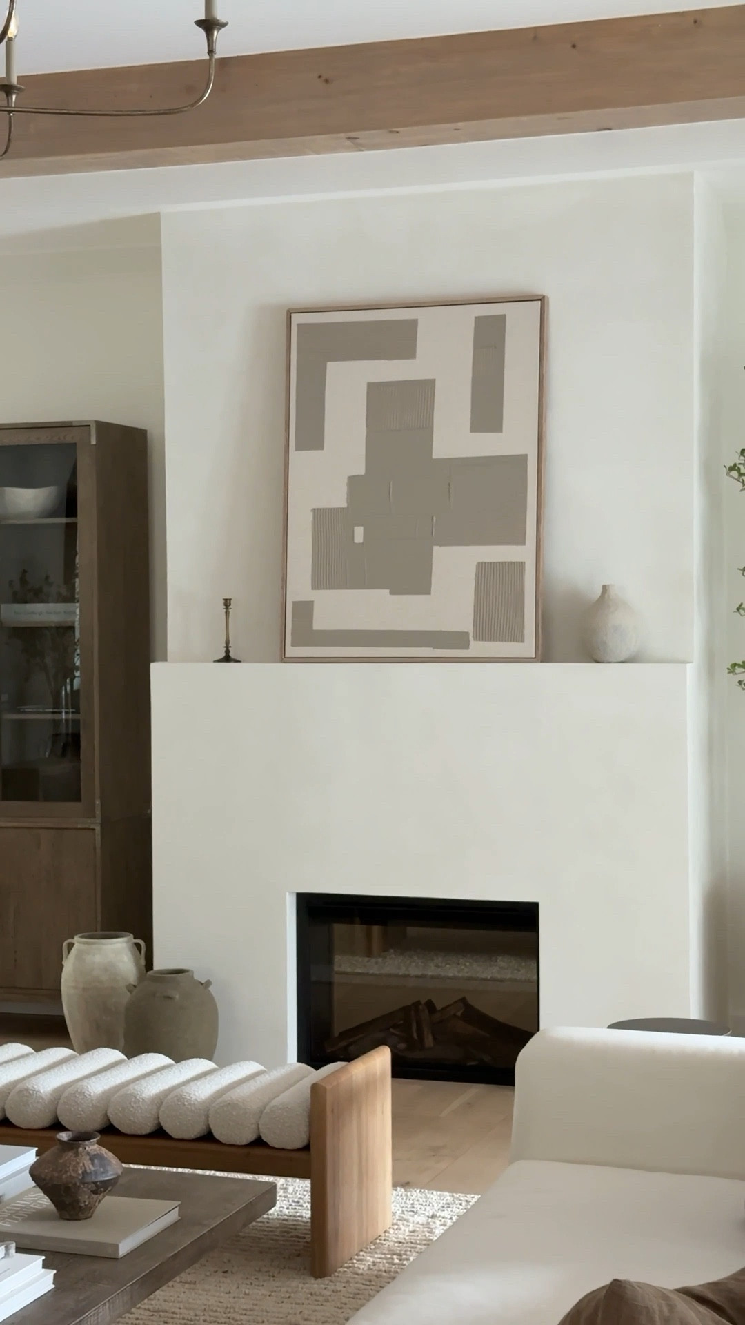From simple farmhouse to modern dream ✨ We started by framing over the existing fireplace to create a whole new focal point, then finished it with @meodedpaint paint + plaster for that soft, custom texture. The transformation is everything 🤍

With @meodedpaint paint + plaster, we mixed colors “off white” and “Swiss coffee” to get this perfect creamy white. Products can be found on Amazon! 
#beforeandafterhome #fireplaceremodel 

#LTKHome