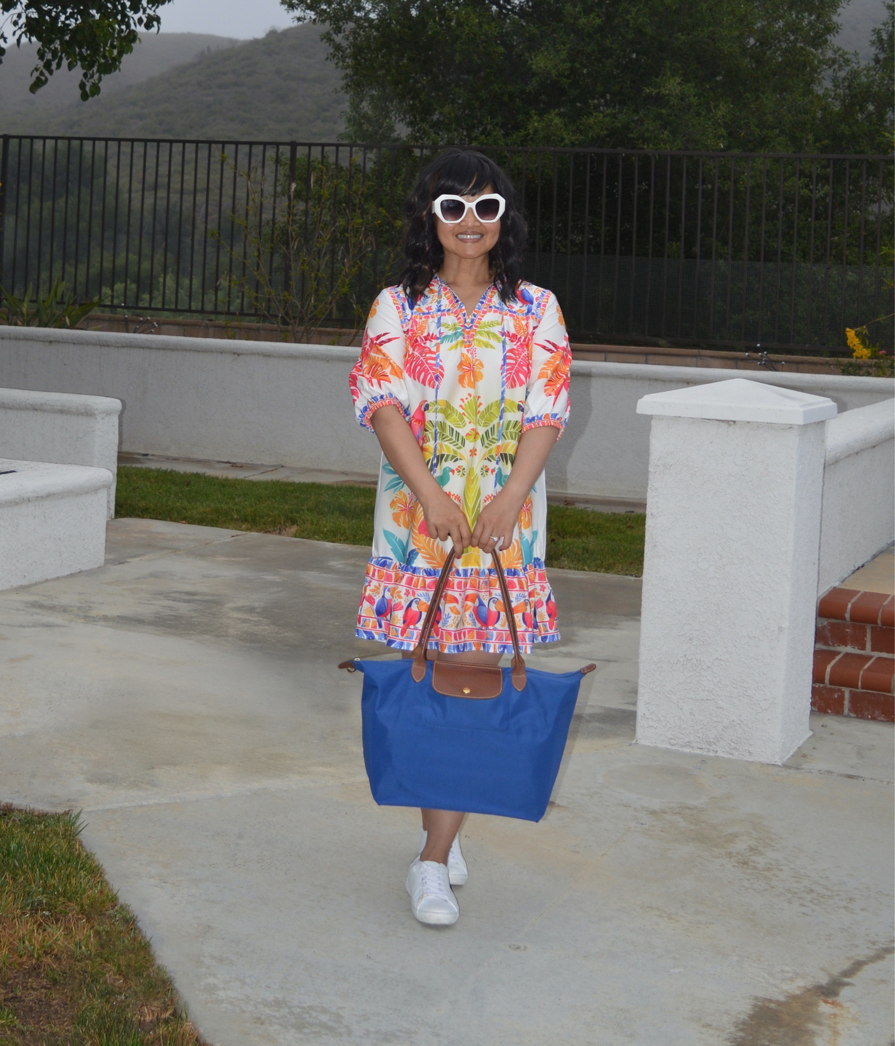 In the summer, it can get very hot in my neck of the woods.  Staying cool while looking cute is a huge priority! This dress from Shein check off all the boxes.  I am wearing it dressed down here with my favorite tote and sneakers for a fun summer look.  I am wearing an xs.

#LTKfindsunder50 #LTKtravel #LTKstyletip