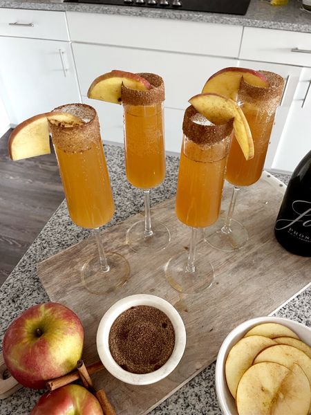 Thanksgiving Mimosa

HOW TO MAKE:
Rim glasses with maple syrup & cinnamon sugar.
Add champagne & splash of apple cider (or whatever ratio you want!)
Garnish with cinnamon sugared apple slice.

Thanksgiving drink, brunch drink, holiday hosting, stemware, drink recipe, kitchen, home, holiday party

#LTKHoliday #LTKhome #LTKparties