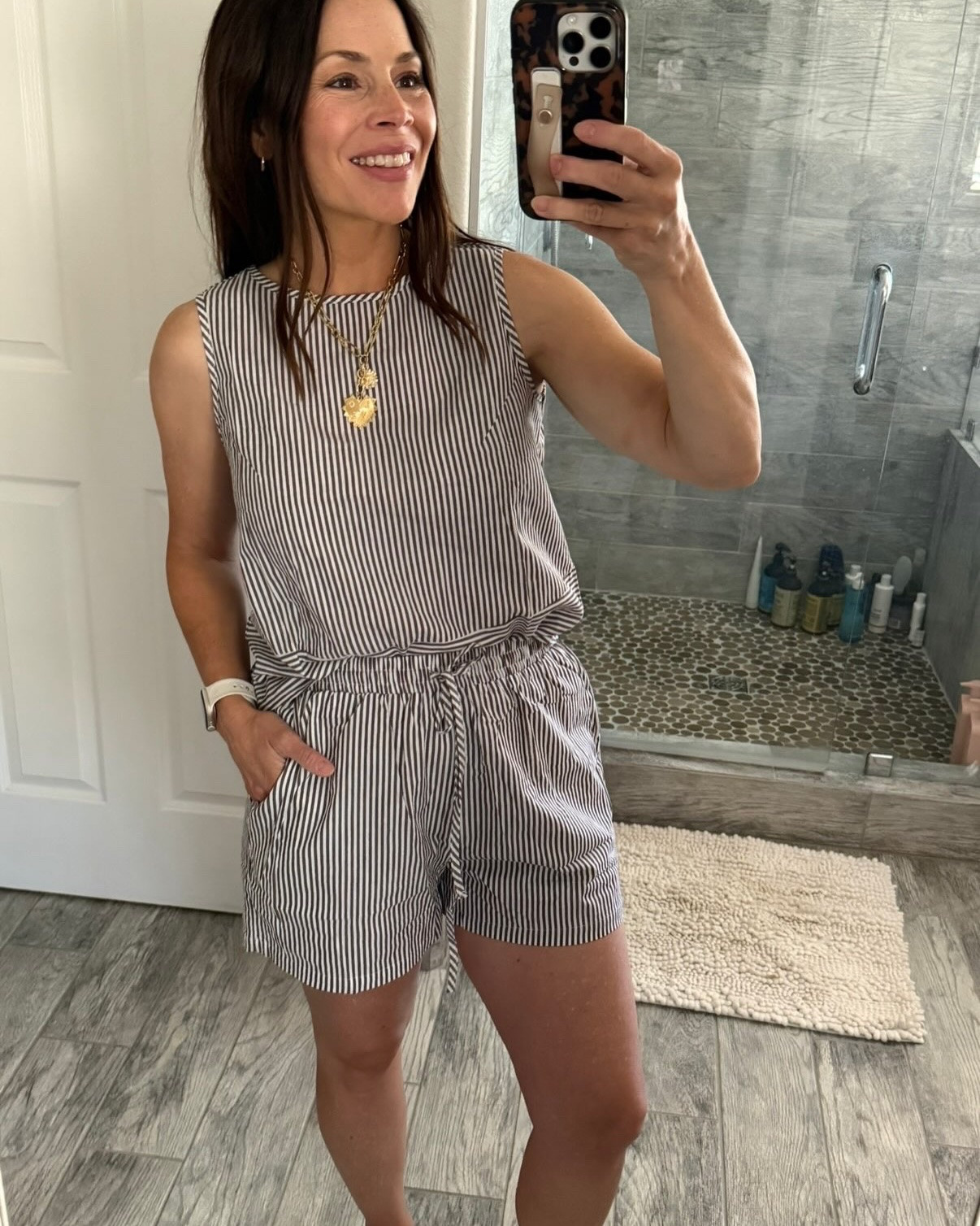 Amazon pieces I'd repurchase again this summer. These casual, effortless sets, tops and pants are still some pieces I'd wear and recommend! Cute pieces that are easy to throw on and go, mix and match and wear over and over. This striped tank and shorts set was a favorite of mine and yours too! I have it in brown and it comes in many colors. Comment  below and I'll share all the details with you. 

Chambray short sleeve and shorts set can be mixed and matched with other pieces in your closet or worn together with your favorite accessories. Love this set! Lightweight, cute on 5'2" frames. Wearing size small

Gingham shorts- drawstring with pockets. Love the brown and would repurchase this color or red, blue... looks perfect with a solid color top or wear with a graphic tee! Wearing size small

Here's the chambray denim set with a sweater over. See how chic and versatile it is! 

This flowy dress is effortless, looks like Madewell but is half the cost. Love it in this neutral olive green. Worn it to antique markets, farmers markets, the movies, brunches, etc. many ways to style. 

Little lace top is so pretty and looks like a Free People top. Be sure not to dry it though(I did and now wear as a swim cover up with white shorts and it is still cute but too short for me to wear now that it shrank- learn from me!) I wore this so much before the dryer incident- jeans, shorts, leopard print pants, striped jeans, gingham shorts! Prettiest lace details in this 100% cotton top.

Floral barrel leg jeans! At the time these felt so bold and I'm glad I went out of my comfort zone. These are easy to wear and are a special outfit vine even when you just throw on a tee and sandals. The barrel leg is slim and not overwhelming on my short legs!

This lounger set is perfect for days at home and easy errands. Soft, light sweater material. Comes in many colors! Sporty mom vibes who like to be comfy!