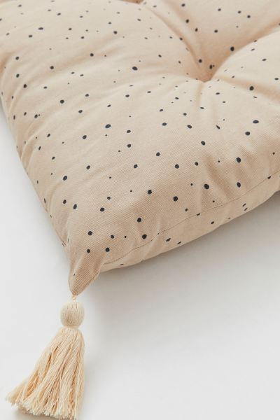 Galette de chaise à pompons | H&M (FR, IT, ES, PT, BE)