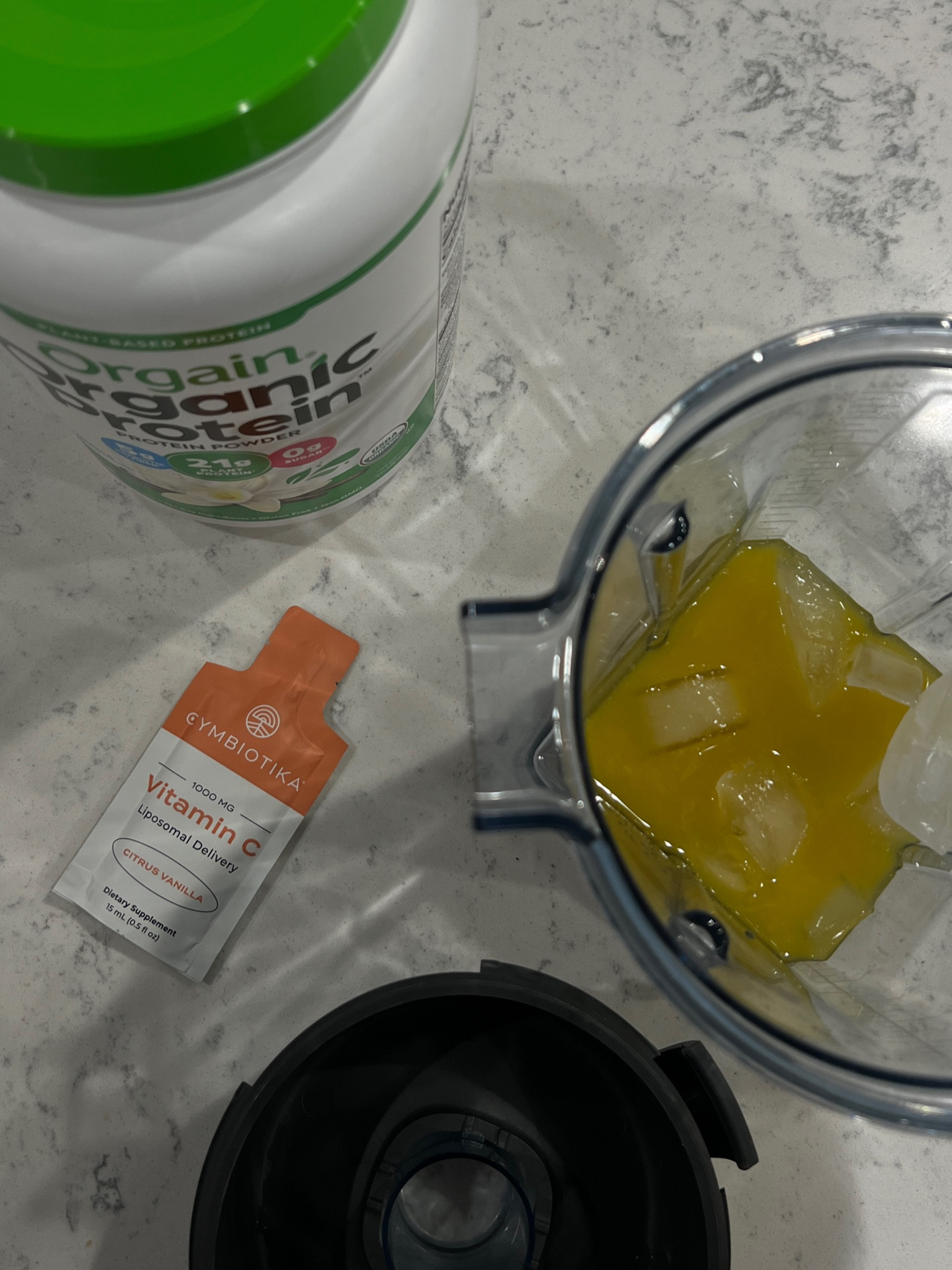 post workout smoothie essentials 🧡 2 scoops of orgain vanilla protein, orange juice, & ice! I've been loving the Cymbiotika vitamin c packs (or just drinking them on their own bc they taste good) on the days | work out bc it's basically the same flavor & enhances the flavor of the smoothie more! loading up on vitamin c and trying not to get sick 🥲

#LTKMostLoved #LTKhome #LTKfitness