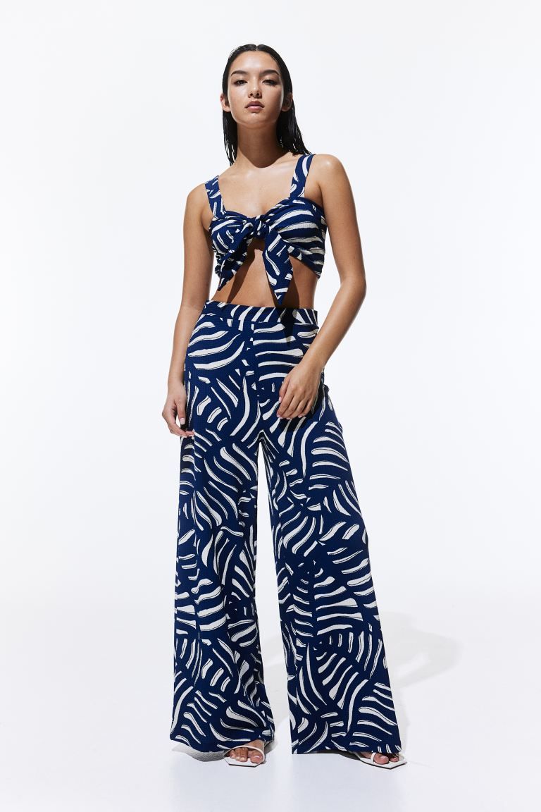 Wide jersey trousers - Dark blue/Patterned - Ladies | H&M GB | H&M (UK, MY, IN, SG, PH, TW, HK)