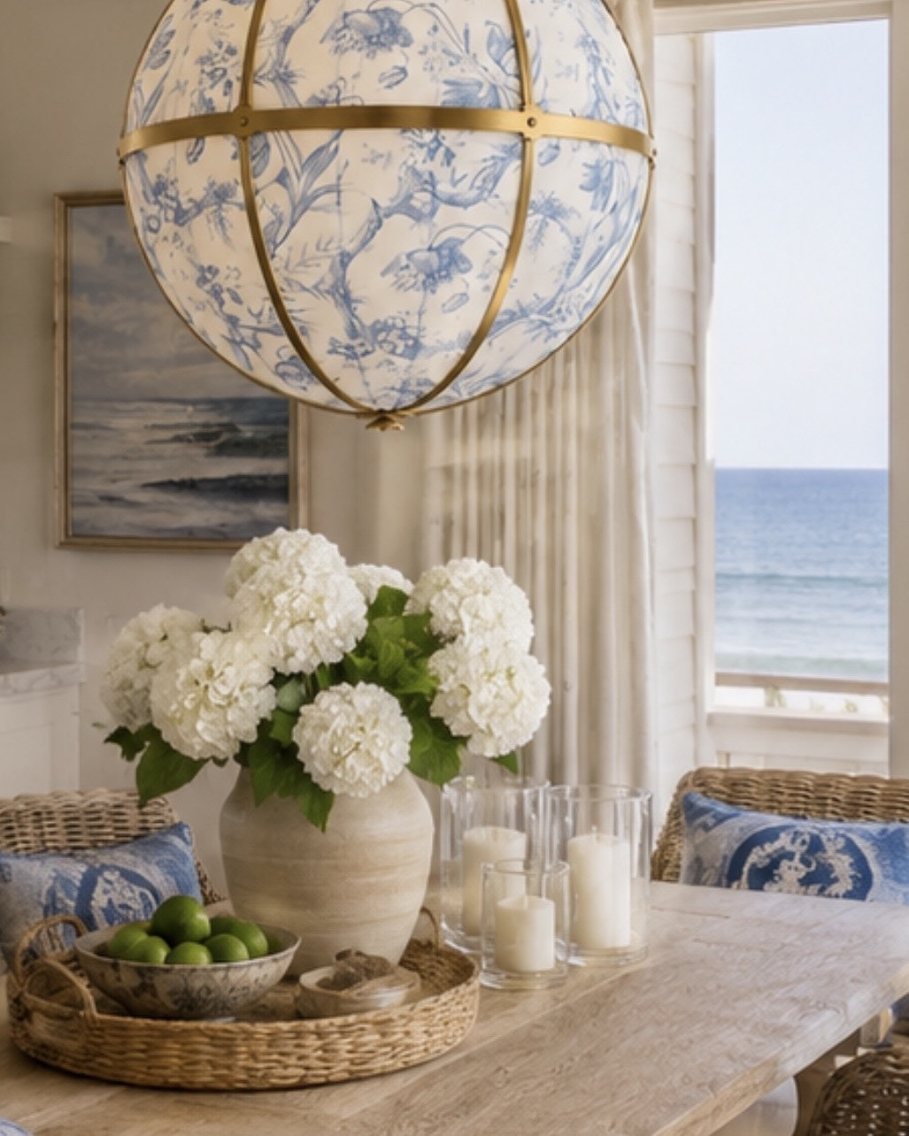 Coastal elegance but make it a statement ✨🌊 This blue and white globe chandelier instantly transformed this kitchen into a dreamy beach house moment. The brass details, toile-inspired pattern, and soft glow make the whole space feel elevated, cozy, and straight out of a magazine.

I love how it adds personality without overwhelming the room, the perfect mix of classic coastal + quiet luxury 🤍

Shop this chandelier and my coastal kitchen favorites on my LTK!

#LTKHome #CoastalStyle #BeachHouseDecor #KitchenInspo #NancyMeyersStyle #CoastalKitchen #InteriorDesign #ChandelierGoals #LuxuryInteriors #OrganicModern #BlueAndWhiteDecor #KitchenDecor #HomeInspo #QuietLuxury #LTKStyle

#LTKHome #LTKSaleAlert #LTKselfcare