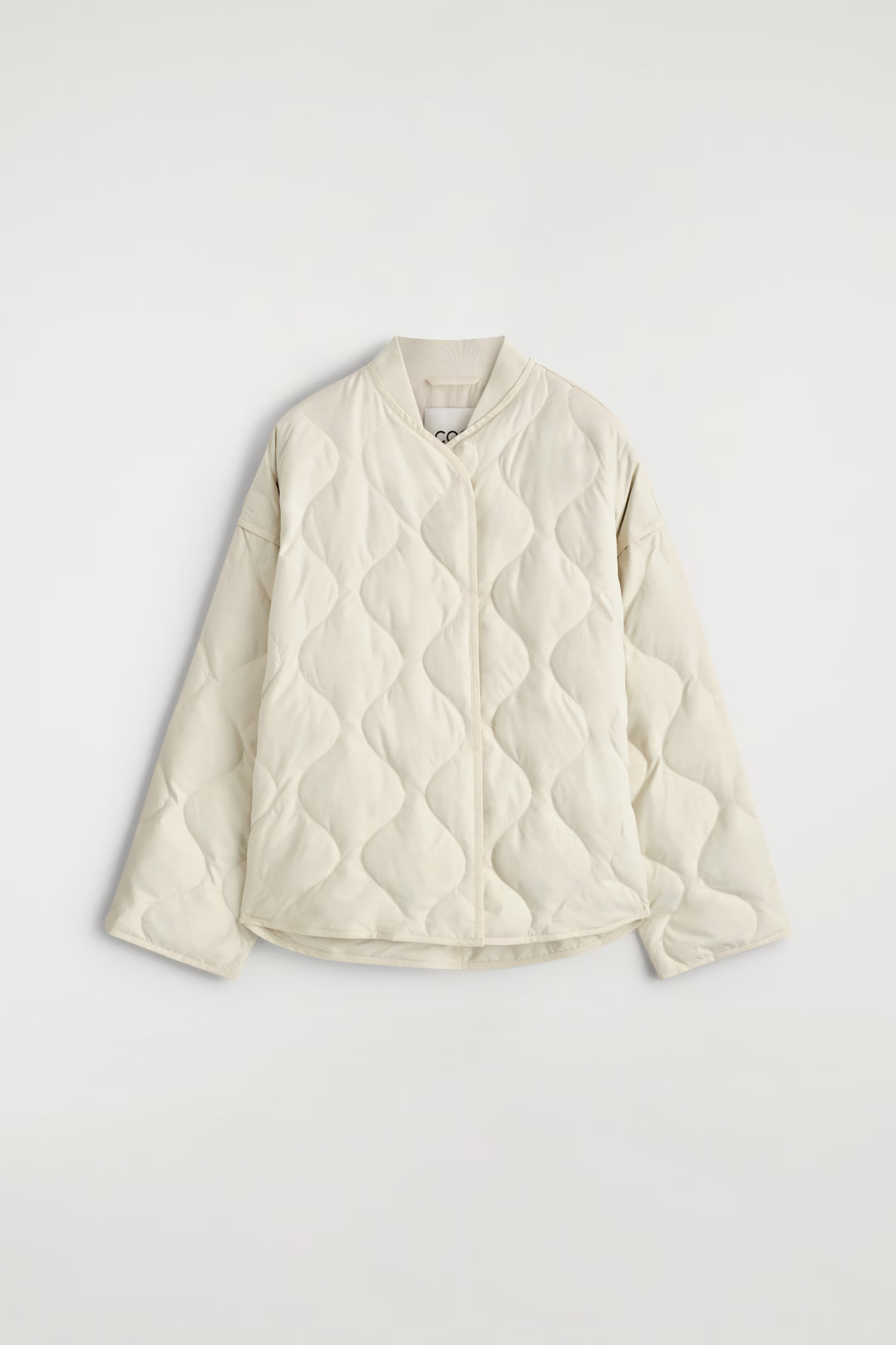 OVERSIZED QUILTED JACKET - IVORY | COS | COS UK