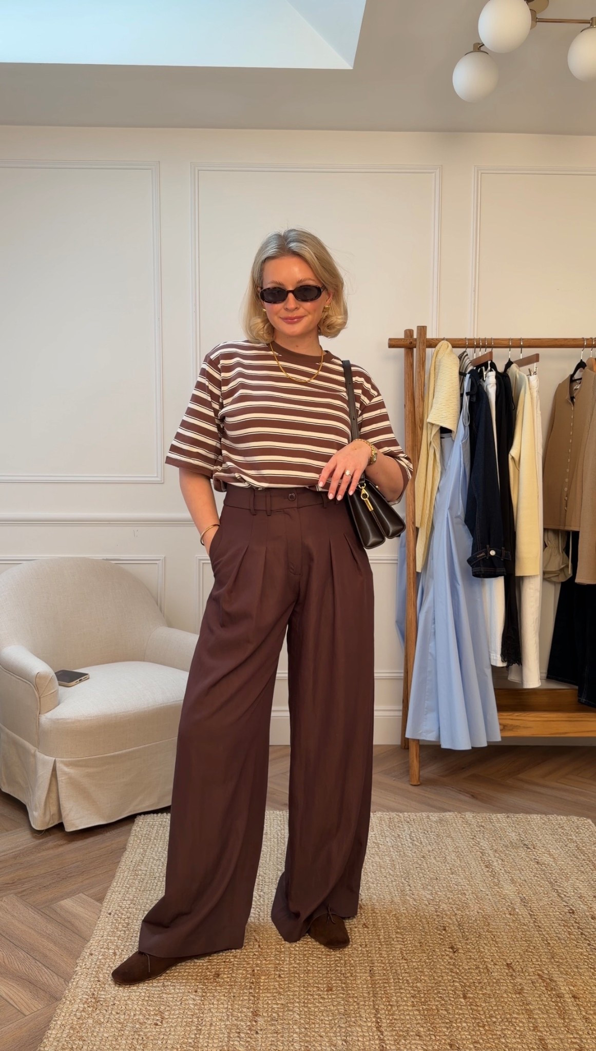 Chocolate brown striped outfit idea with suede ballet flats
Top - size S
Trousers - size 10
Handbag - RSVP Paris

#LTKspring #LTKstyletip #LTKuk