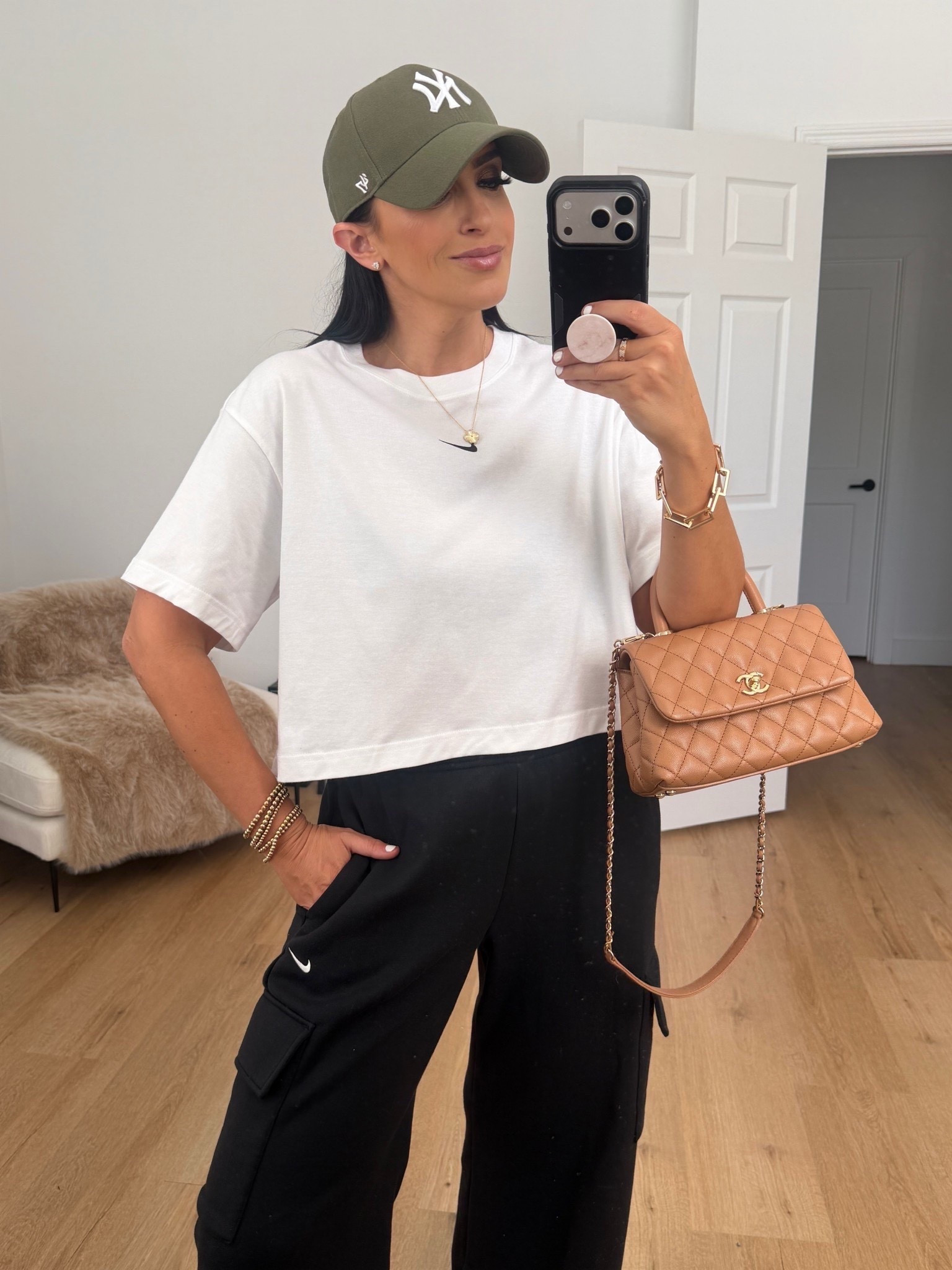 Nike Sportswear Phoenix Fleece wearing size small. Women's Loose Short-Sleeve Cropped T-Shirt wearing size medium. 
