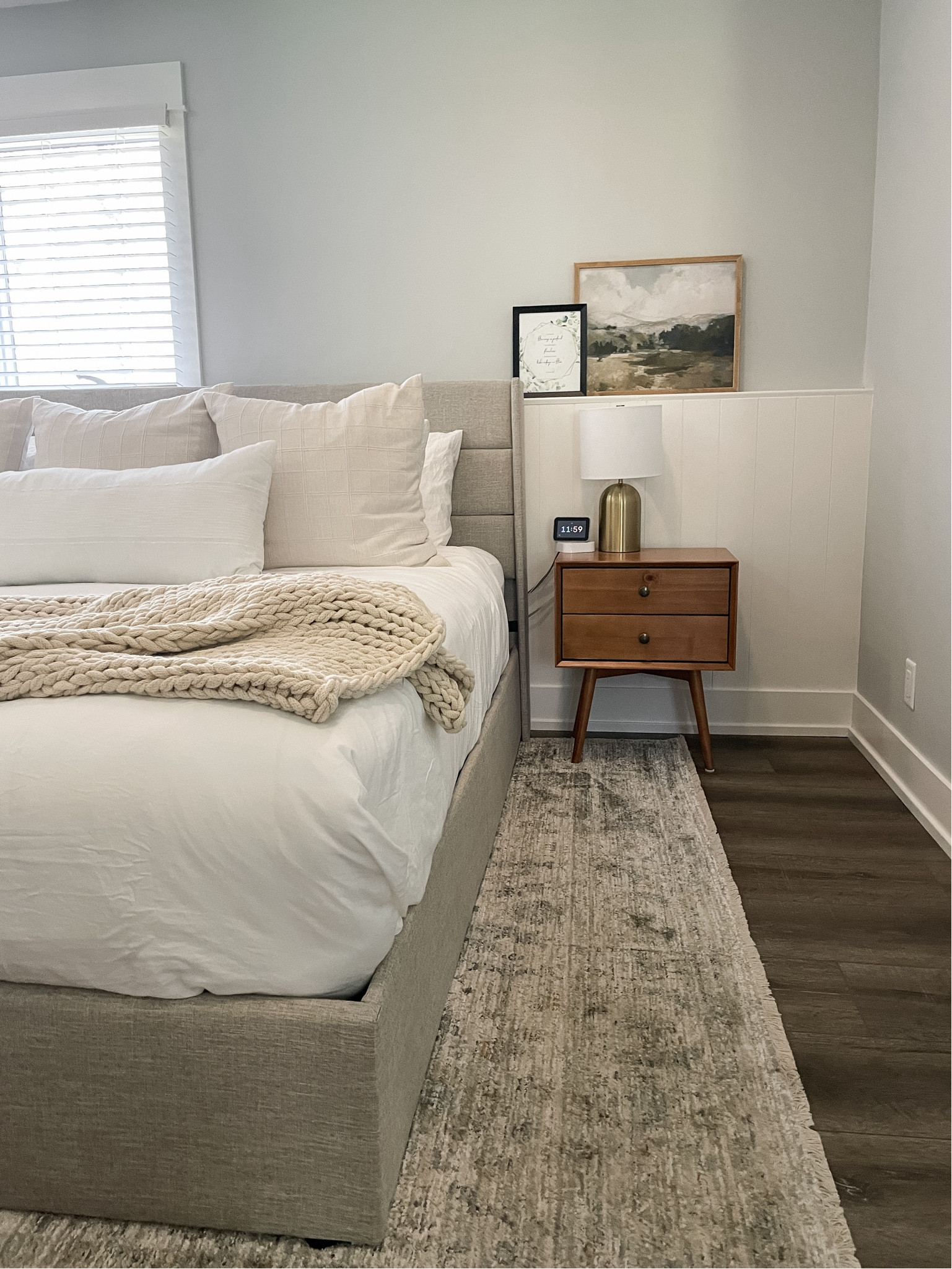 This client bathroom is clean, modern and so pretty on a budget.  

Mid century night stand.  Upholstered bed frame.  Jean Stoffer area rug.  Gold table lamp.  Shiplap panel.  Neutral Target bedding.  

#LTKfamily #LTKhome #LTKstyletip