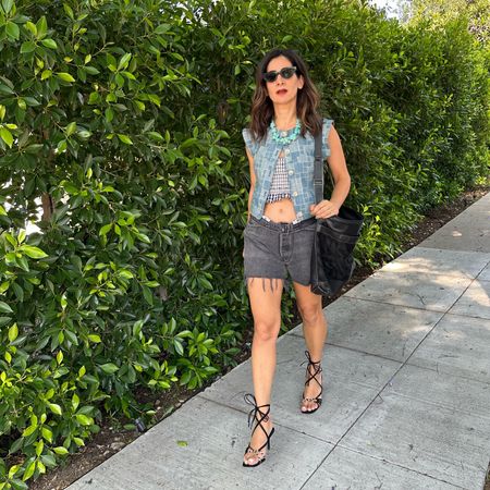 Mom duty! I love this Sezane patchwork denim vest that can be worn as a top or great layering piece. Vintage Levi’s denim shorts are also a must. I sized up 3 sizes to get a baggier fit. So good! 

Sezane finds. Vintage denim  