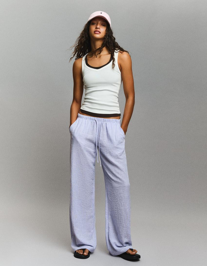 Linen blend trousers with an elasticated waistband - Women | Bershka UK