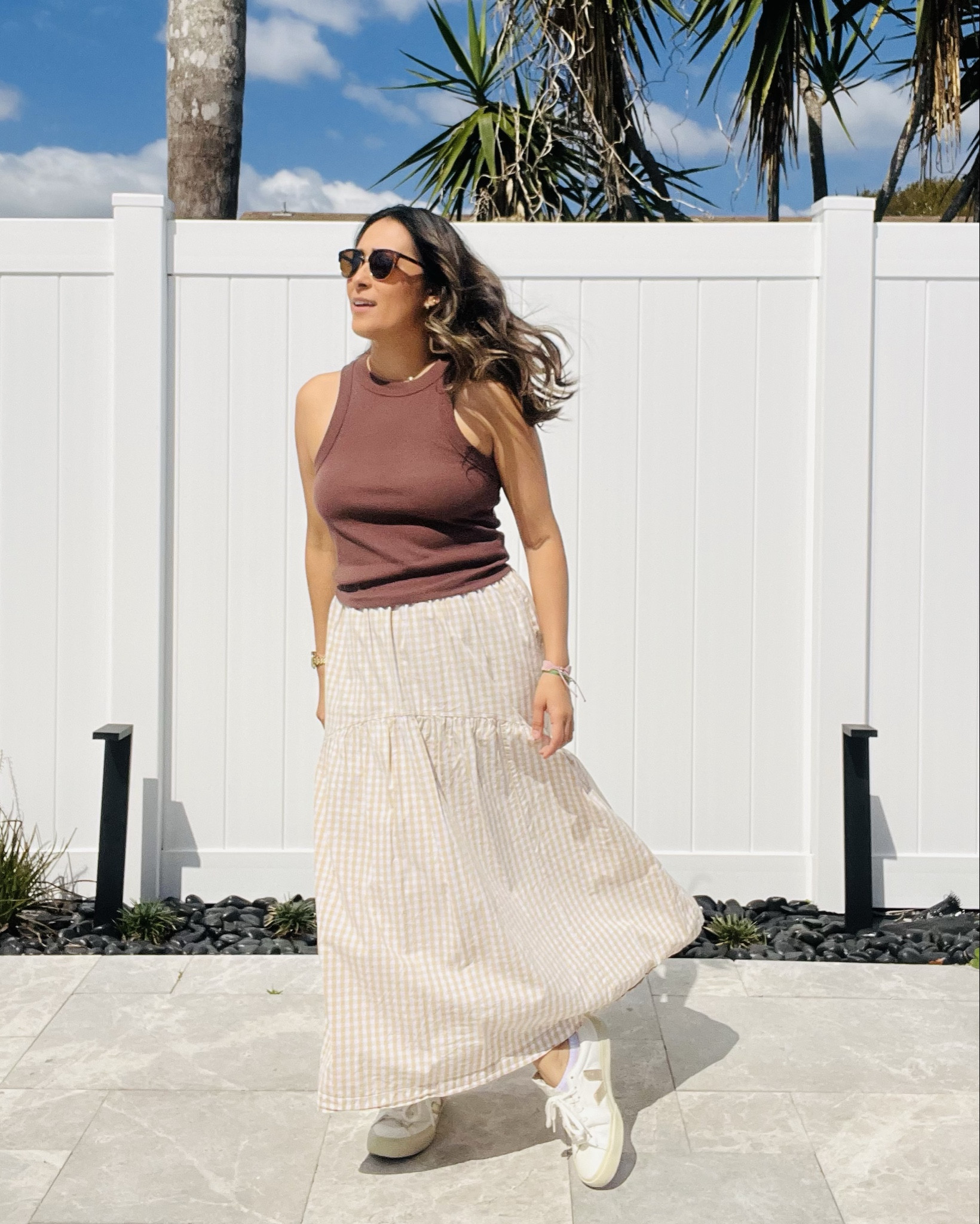 Spring neutral outfit 🤍
Lightweight gingham skirt, fitted tank, and comfy sneakers. 

#LTKootd