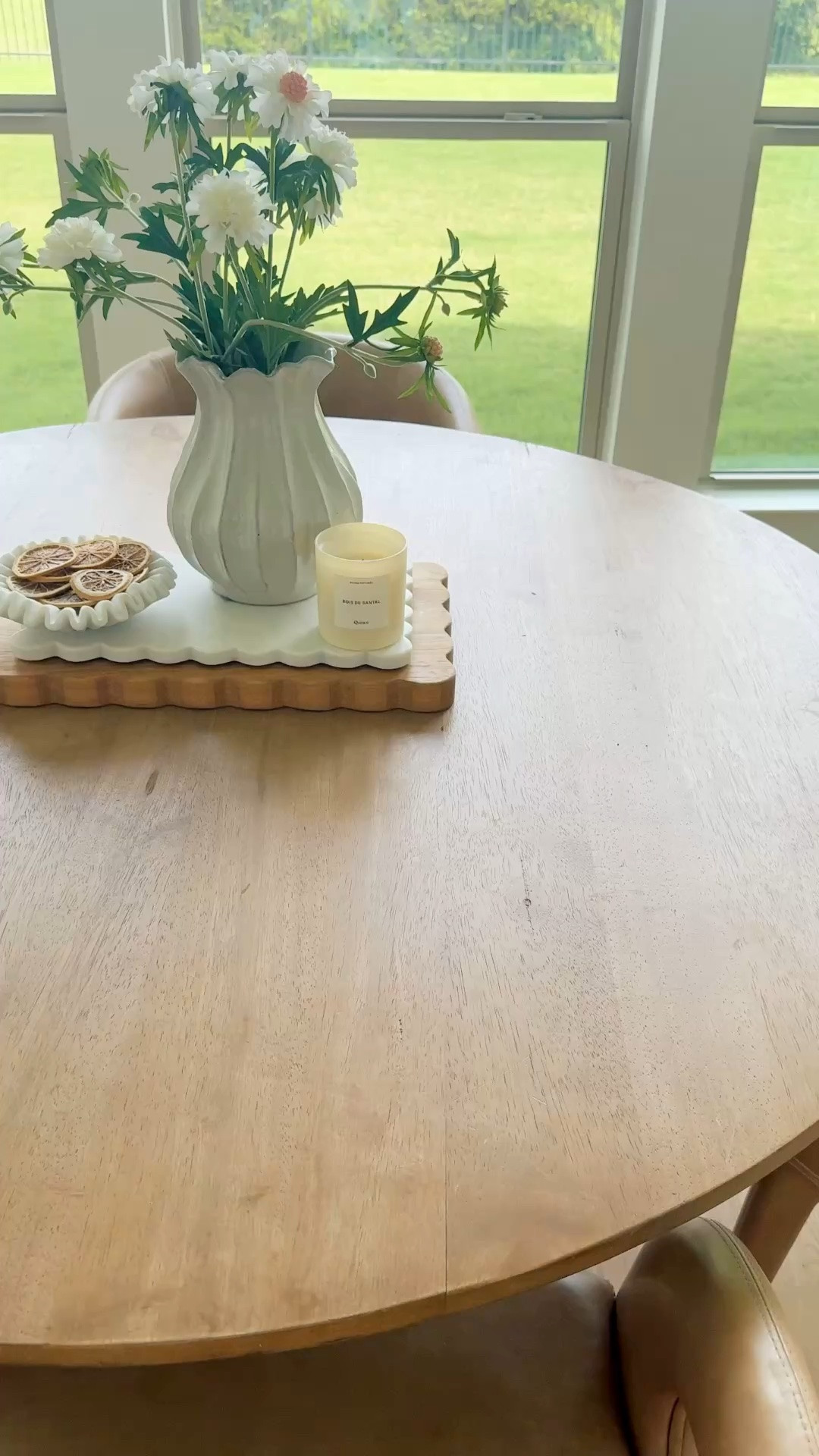Simple dining table styling is one of my favorite ways to refresh a space without changing much. My favorite vase from Target, faux florals, a favorite candle, and scalloped boards instantly make a room feel more layered and lived in. I’m linking this centerpiece along with more neutral home decor finds and everyday favorites that create that cozy organic modern look. Follow me on LTK for daily fashion, home decor & Amazon finds.

#LTKSaleAlert #LTKHome