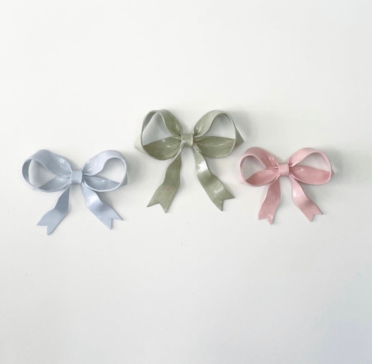 The prettiest handmade ceramic ribbons are on SALE for 40% OFF!!! Such a good deal — I don’t think I have ever seen them go on sale like this👏🏼👏🏼👏🏼 

They come in several colors- shades of pinks, blue, white, lilac, ivory, green 🎀🎀🎀 

These are the sweetest addition to any baby nursery for boy or girl 🌸🩵 or would be precious in a little girls room🩷

Sale only lasts until APRIL 8th so run and grab them while you can 🙌🏼🏃🏻‍♀️💨 use code SSALE26 at checkout for 40% OFF ✨ 

#nursery #nurserydecor #nurseryinspo #baby #babyroom #babygirl #toddlergirl #girl #littlegirlroom #girlroom #girly #girldecor #bows #handmade #babyboy #boy #littleboy #boyroom #boydecor #girlroom #girldecor#homedecor #art #artwork #preppy #preppystyle #classic #classicstyle #grandmillenial #grandmillenialstyle 
#homedecor #home #interior #interiordesign #cozyspaces #warmspaces #ltkhome #homedesign #homestyle #design #style #classicstyle #classicdecor #classicstyle #timeless #timelessdecor #timelessstyle #affordable #affordabledecor #affordablestyle #budget #budgetfriendly #budgetdecor #budgetstyle #styleonabudget #homedecoronabudget #homeinspo #homestyle #deal #dealoftheday #sale #salealert #majorsale  
Anyone else follow mycah and love this room!!

#LTKHome #LTKBump #LTKBaby