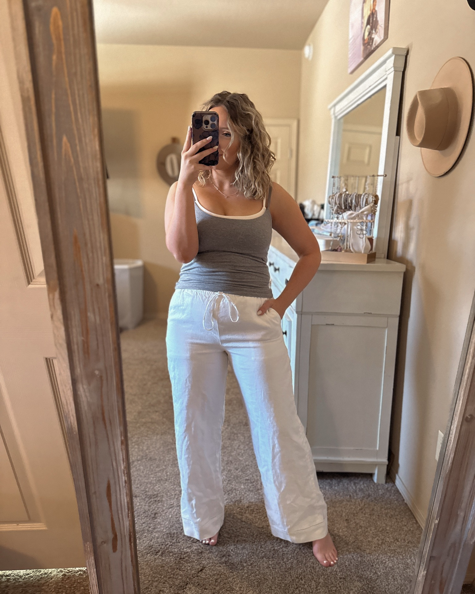 Tank/pants: wearing my true size medium. Don’t dry the pants or they’ll shrink - only air dry them.

This outfit is the perfect mix of relaxed and put-together. The 90s-inspired cami is double lined and bra-free, so it feels effortless but still supportive. Paired with high-quality white linen pants that are lightweight, breathable, and polished, it’s the kind of look that works for everything from errands to dinner plans while still feeling comfortable and elevated.



90s cami double lined bra free, Abercrombie 90s cami women, no bra cami supportive women, white linen pants women high quality, wide leg linen pants summer, breathable linen outfit women, minimalist summer outfit women, effortless neutral outfit women, capsule wardrobe summer pieces, relaxed elevated outfit women, vacation outfit linen pants, casual chic summer outfit, postpartum friendly linen pants, easy everyday summer outfit @abercrombie

#LTKgrwm #LTKmomlife #LTKootd